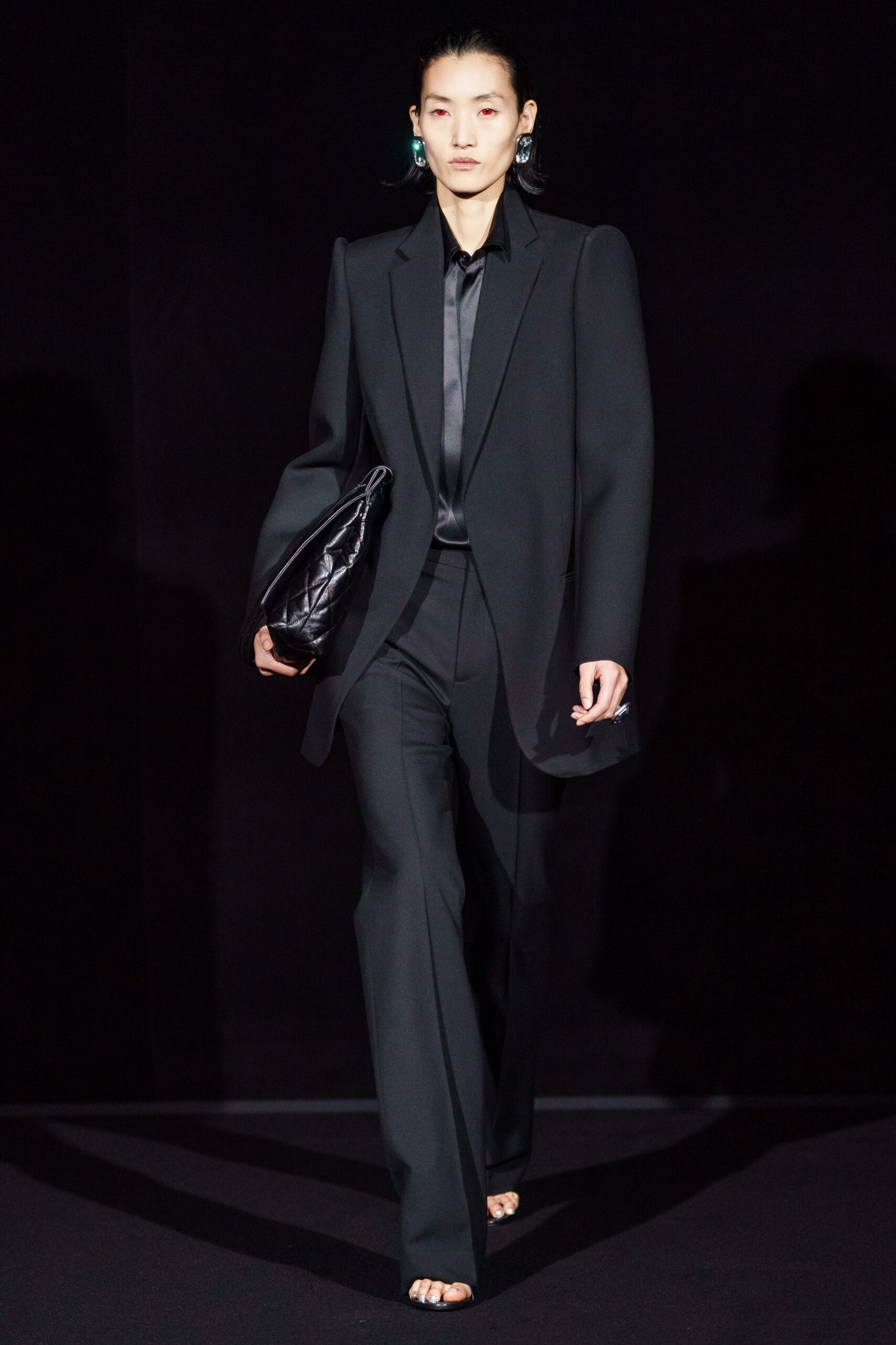 black tailored suit with silk shirt