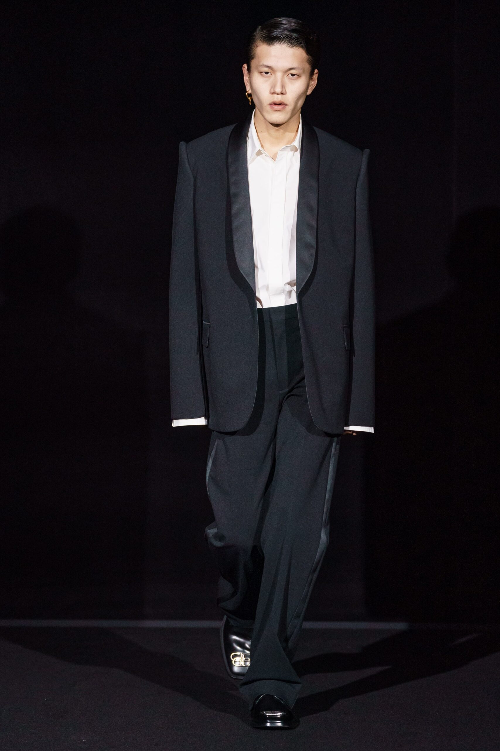 black tailored suit with white shirt