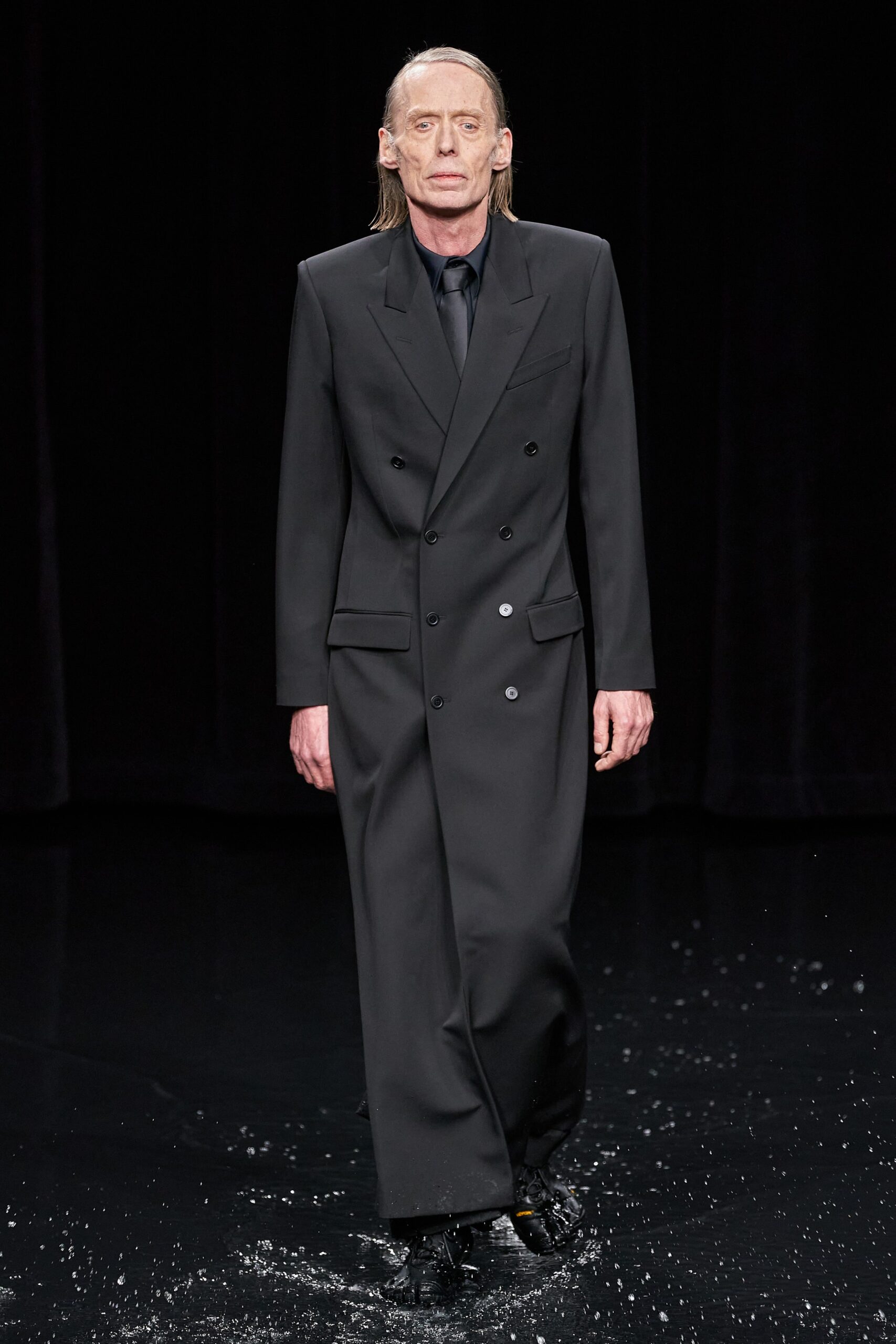 black tailored double-breasted coat