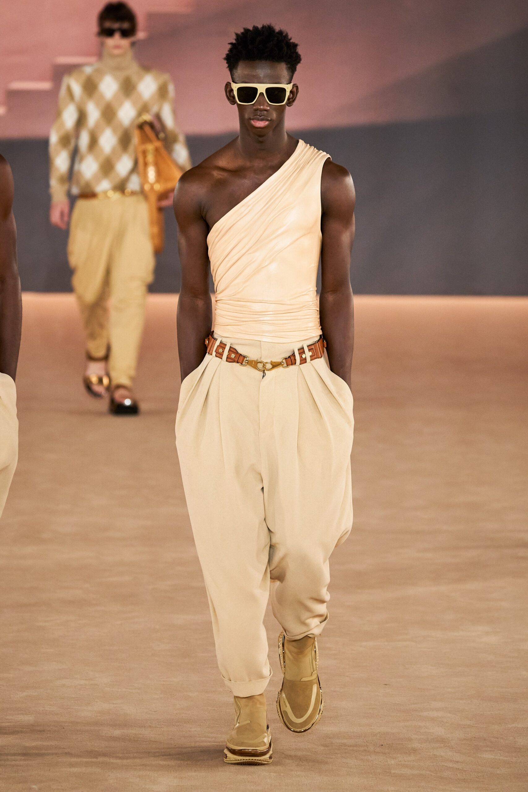 beige asymmetric top with relaxed pants