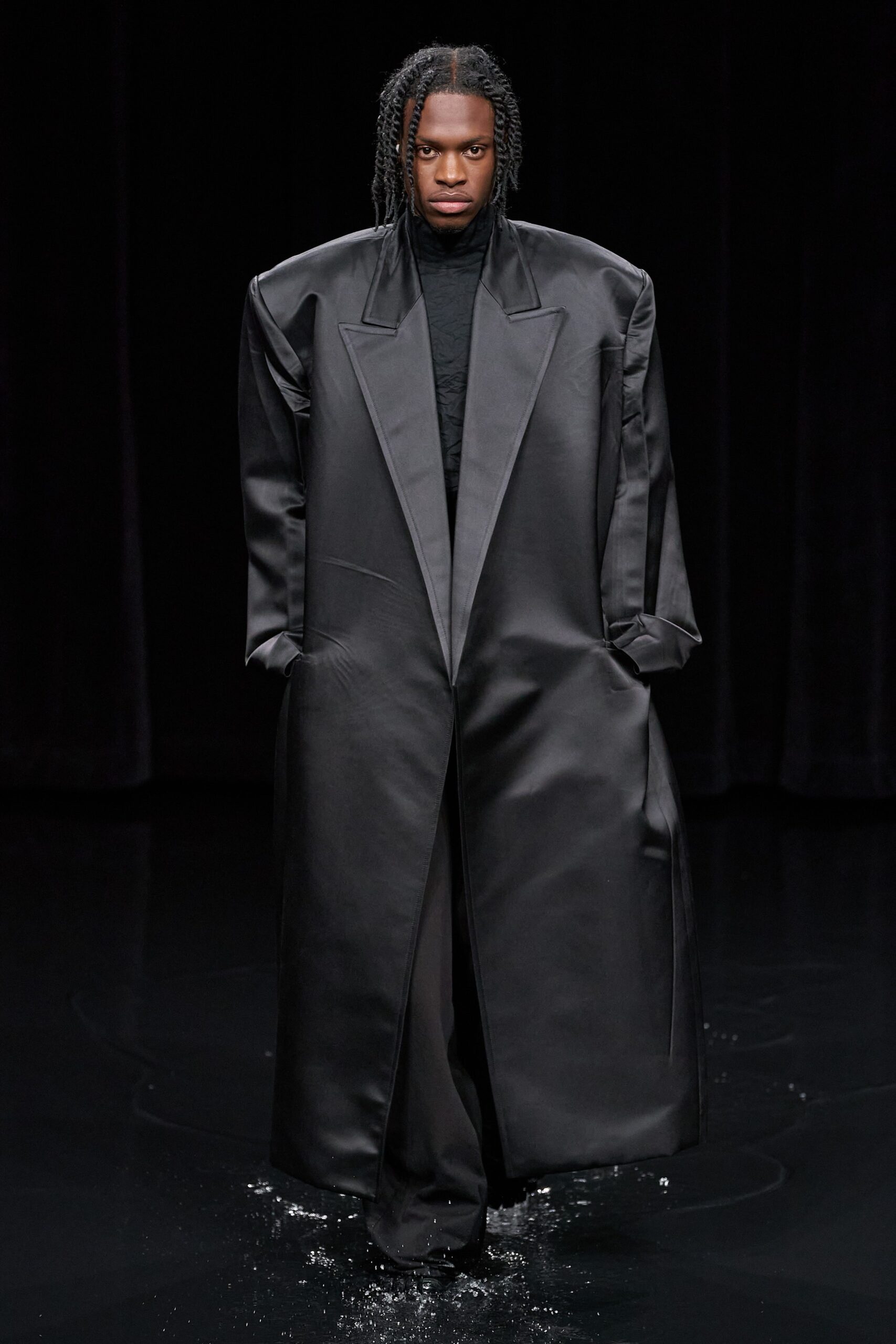black leather long-sleeve collared oversized structured coat