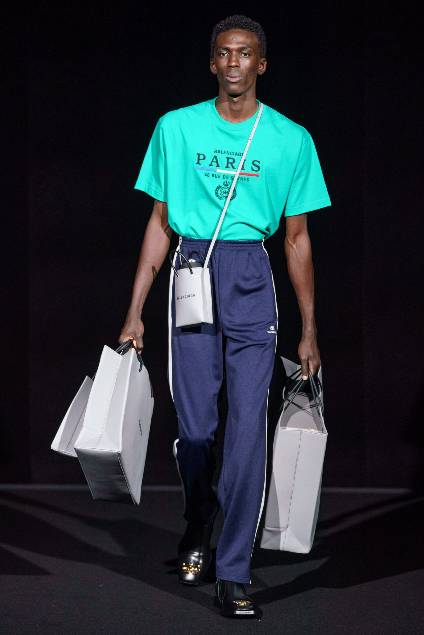 green relaxed t-shirt with blue pants