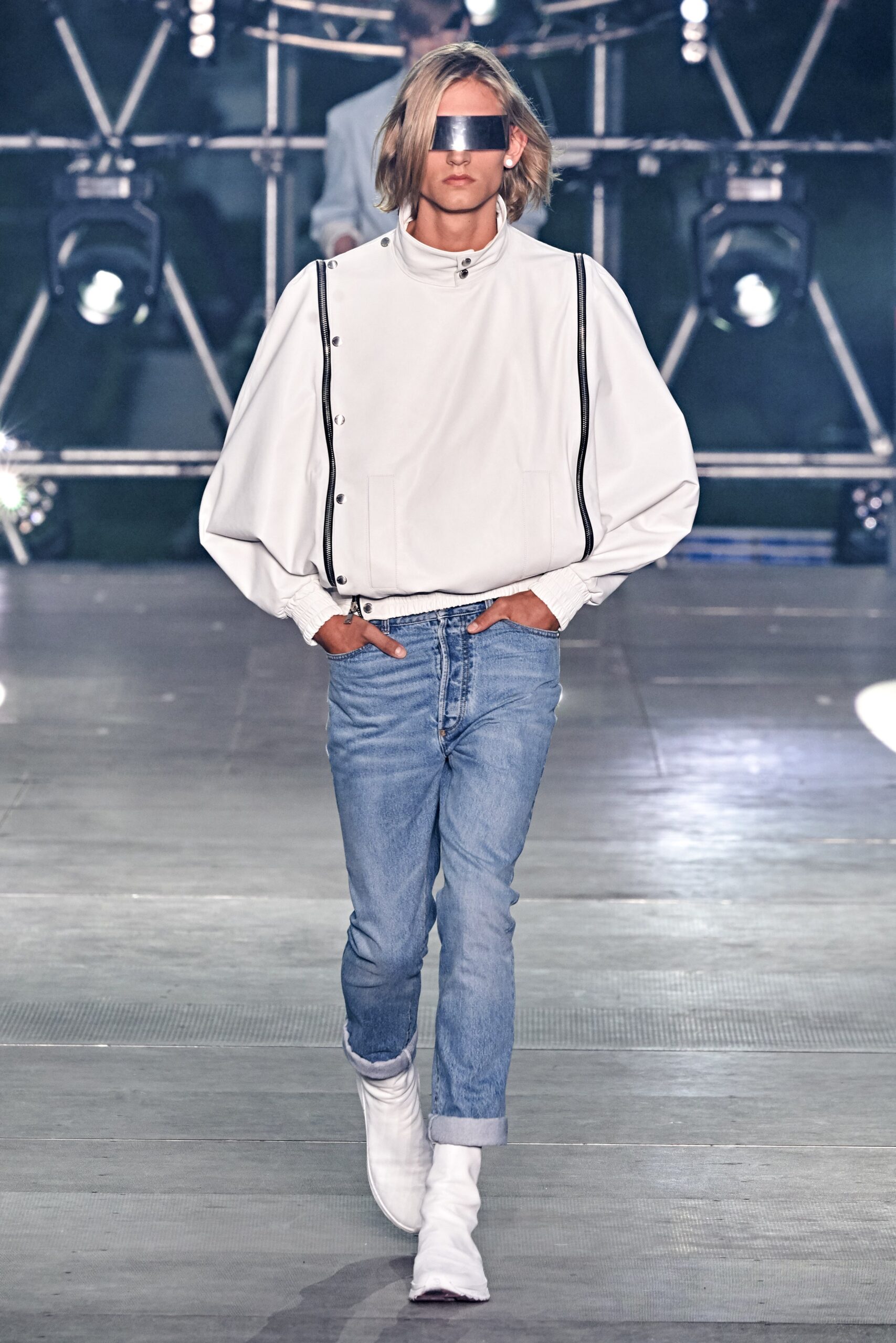 white relaxed jacket with blue jeans