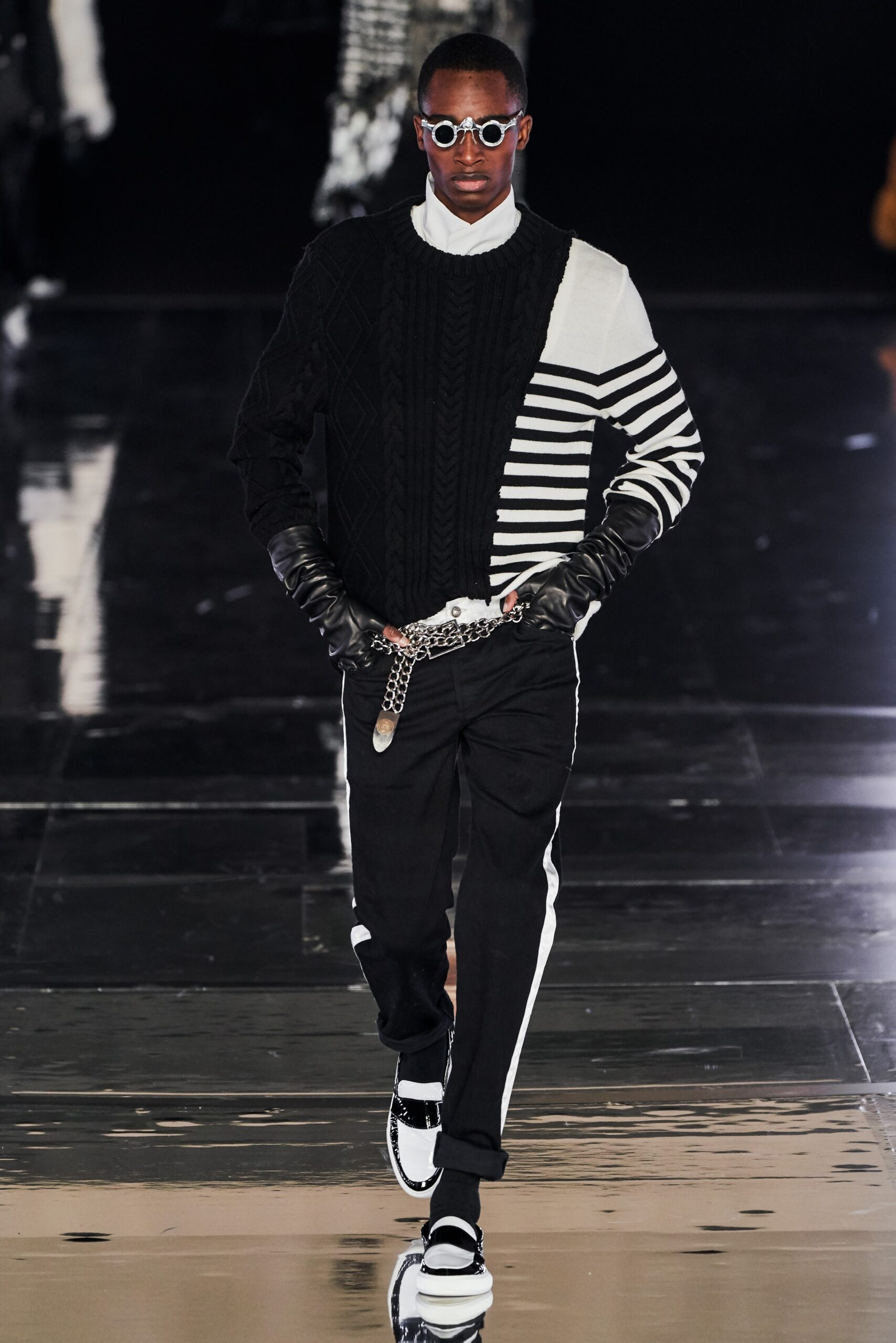black and white fitted sweater with slim pants