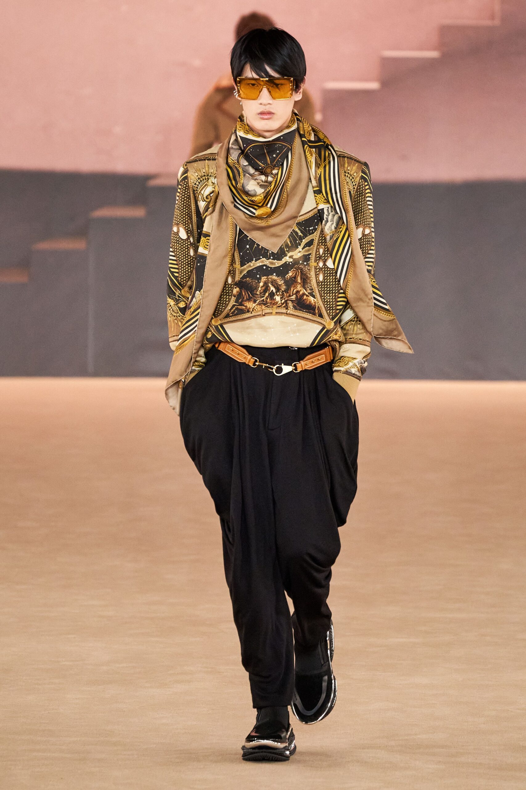 gold printed blouse with black pants