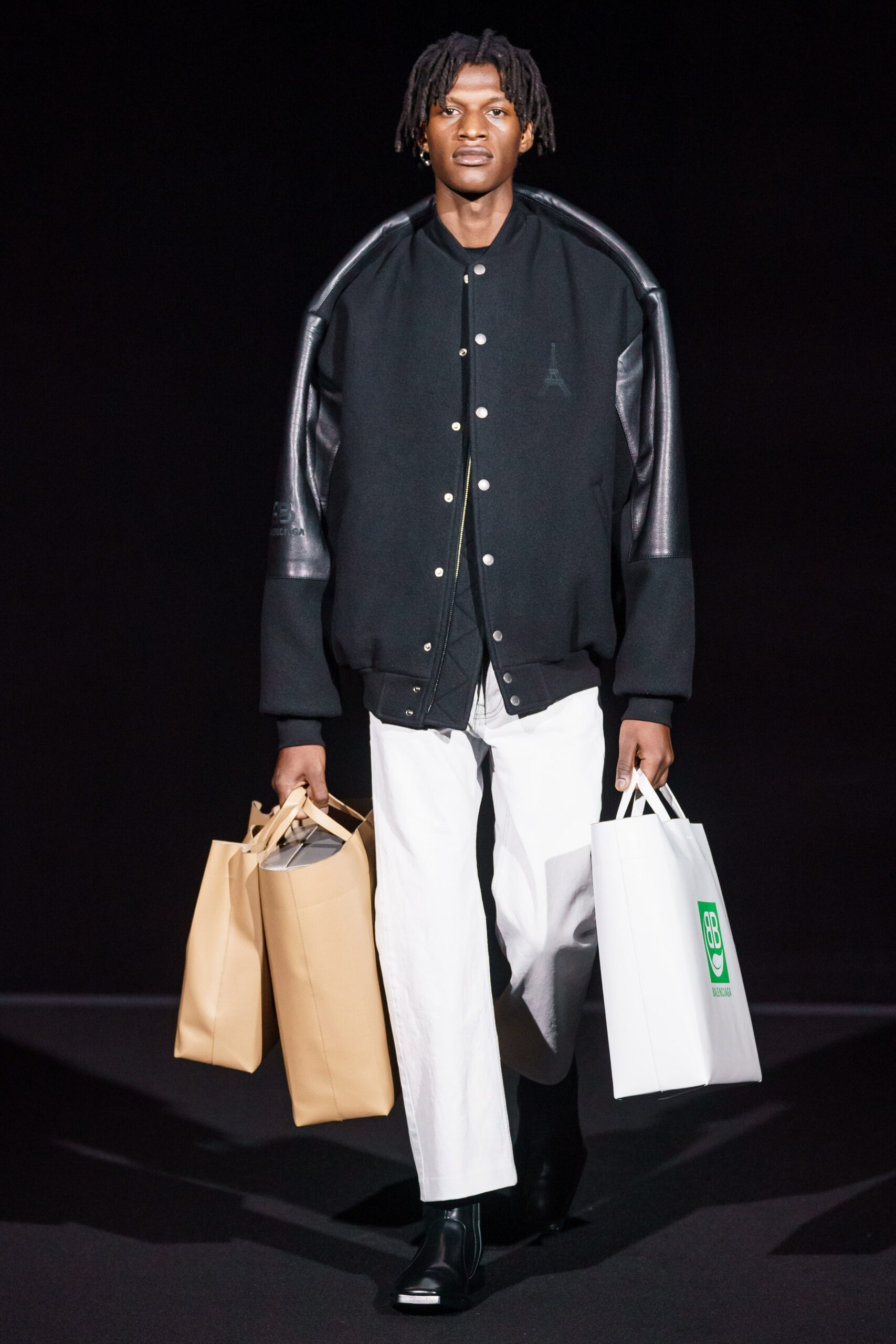 black oversized jacket with white pants