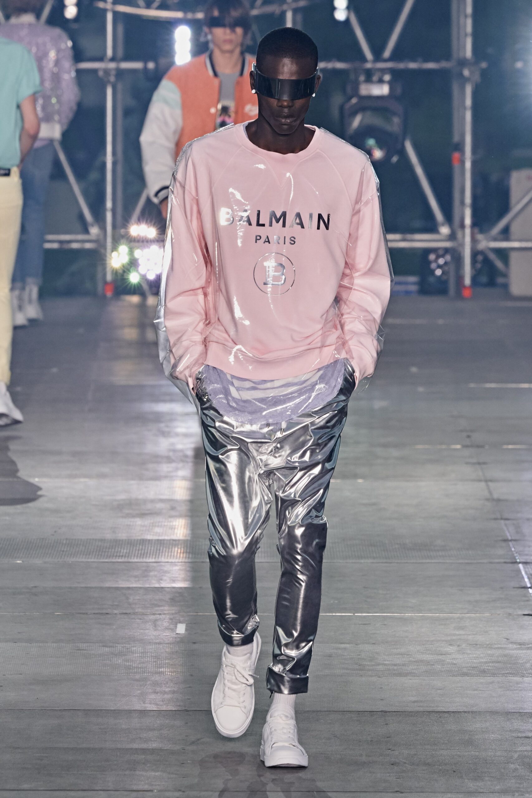 pink vinyl sweater with silver pants