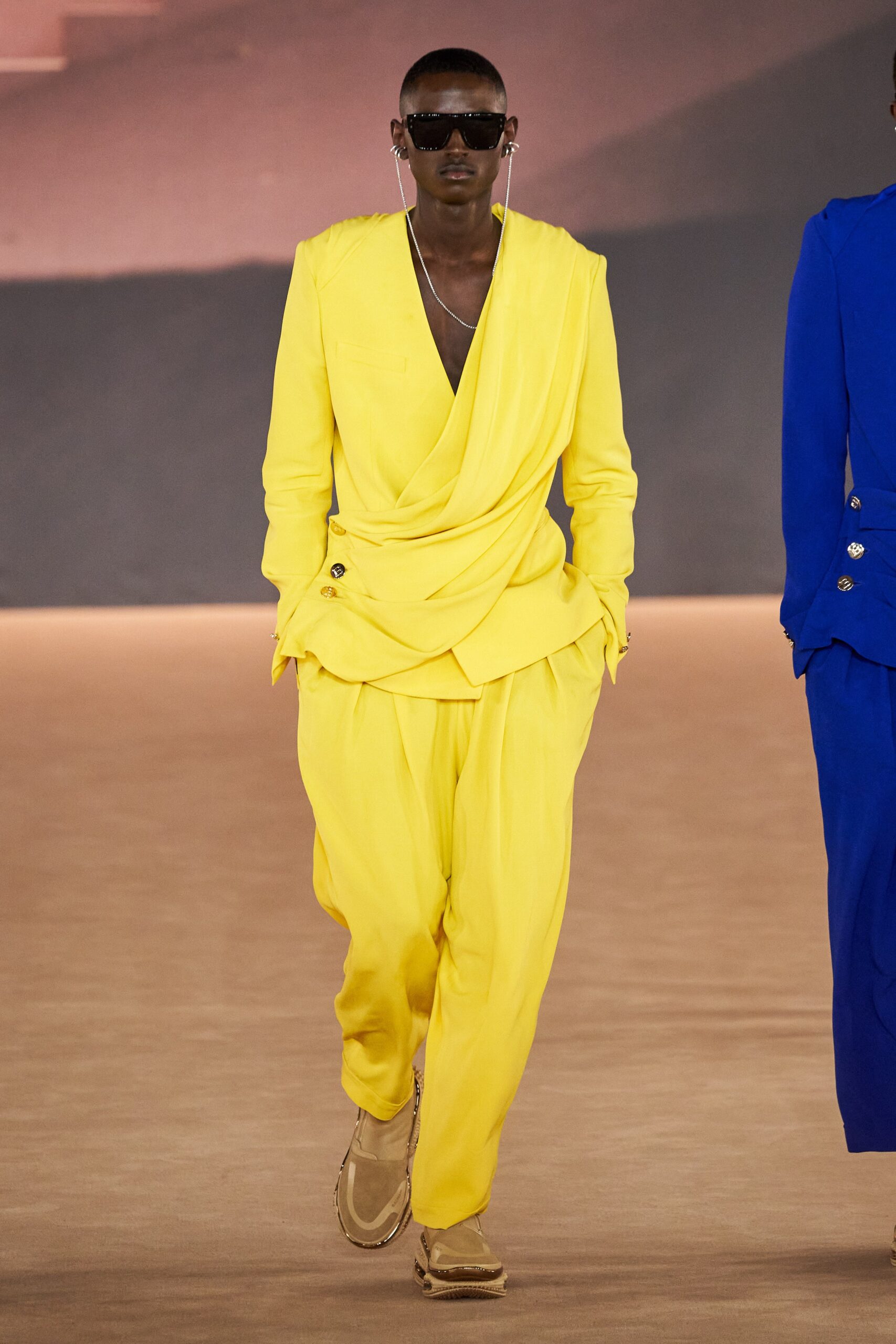 yellow relaxed suit with sunglasses