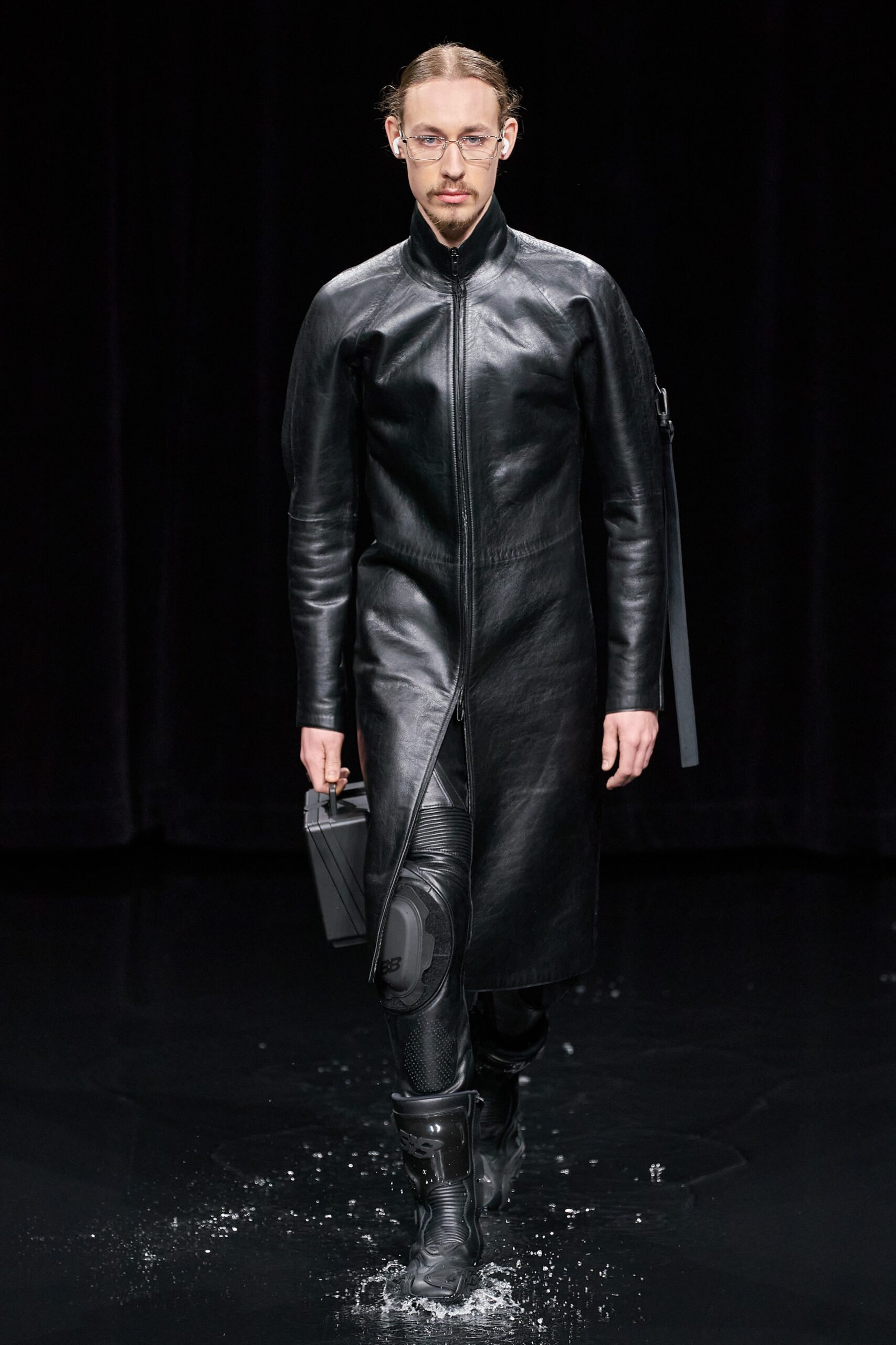black leather long-sleeve collared fitted zippered straight-leg coat