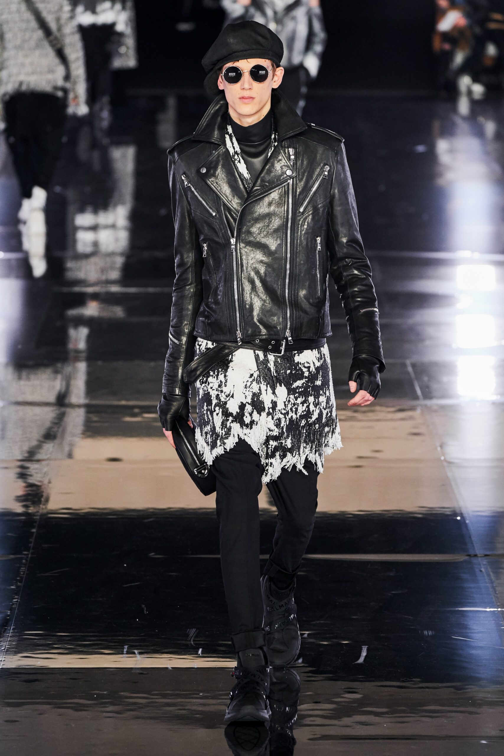 black leather jacket with layered top