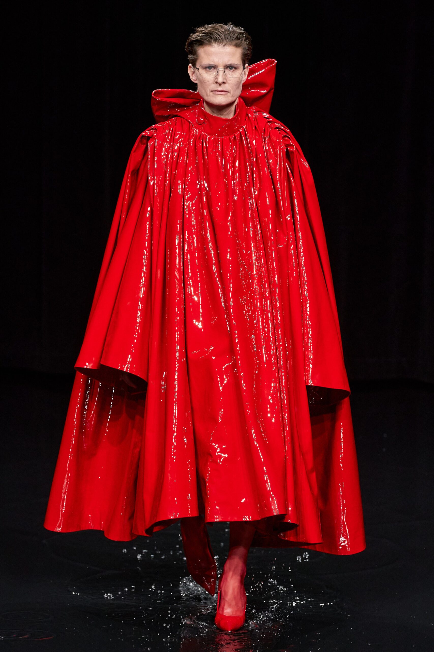 shiny red vinyl cape