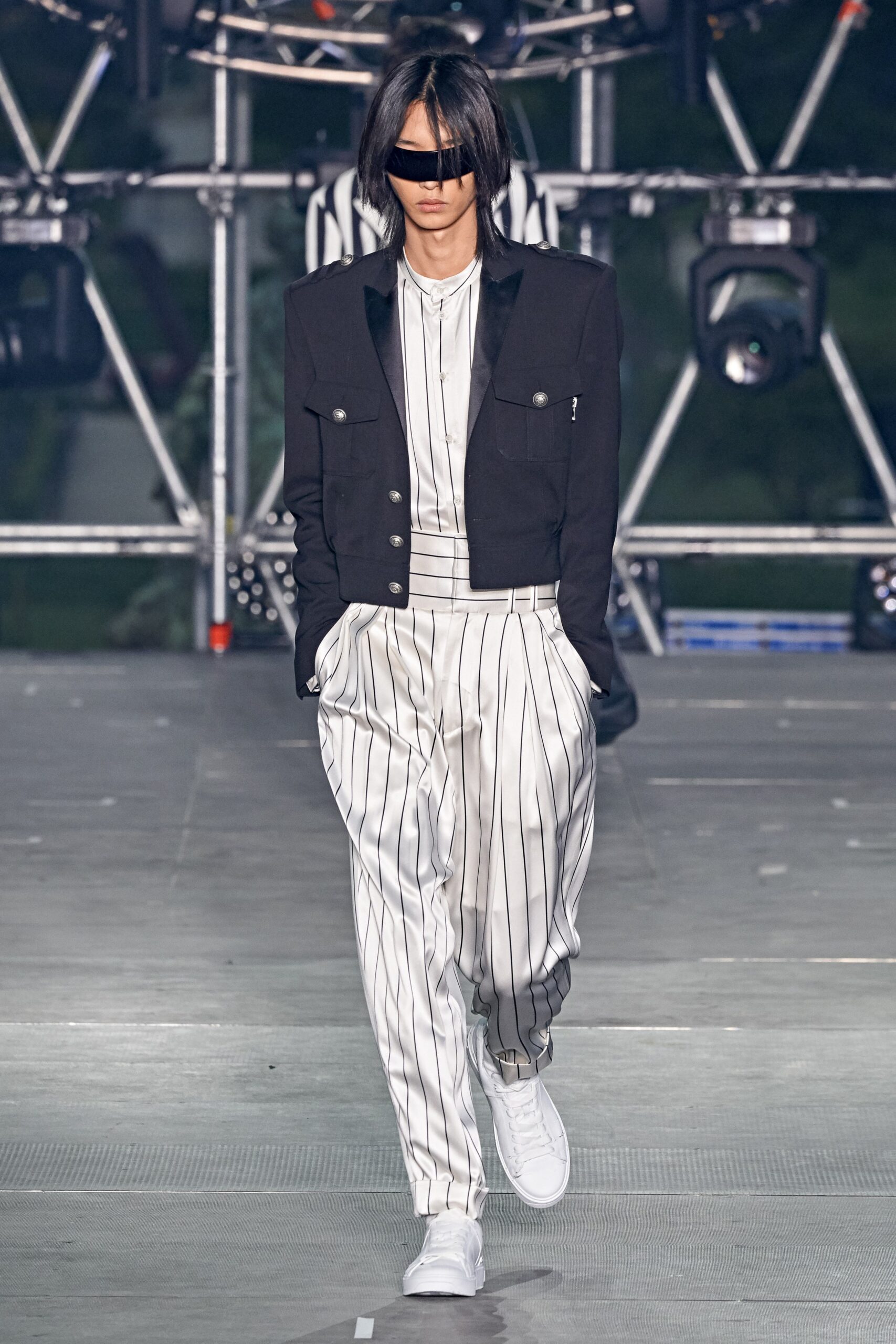 black tailored jacket with striped shirt and pants