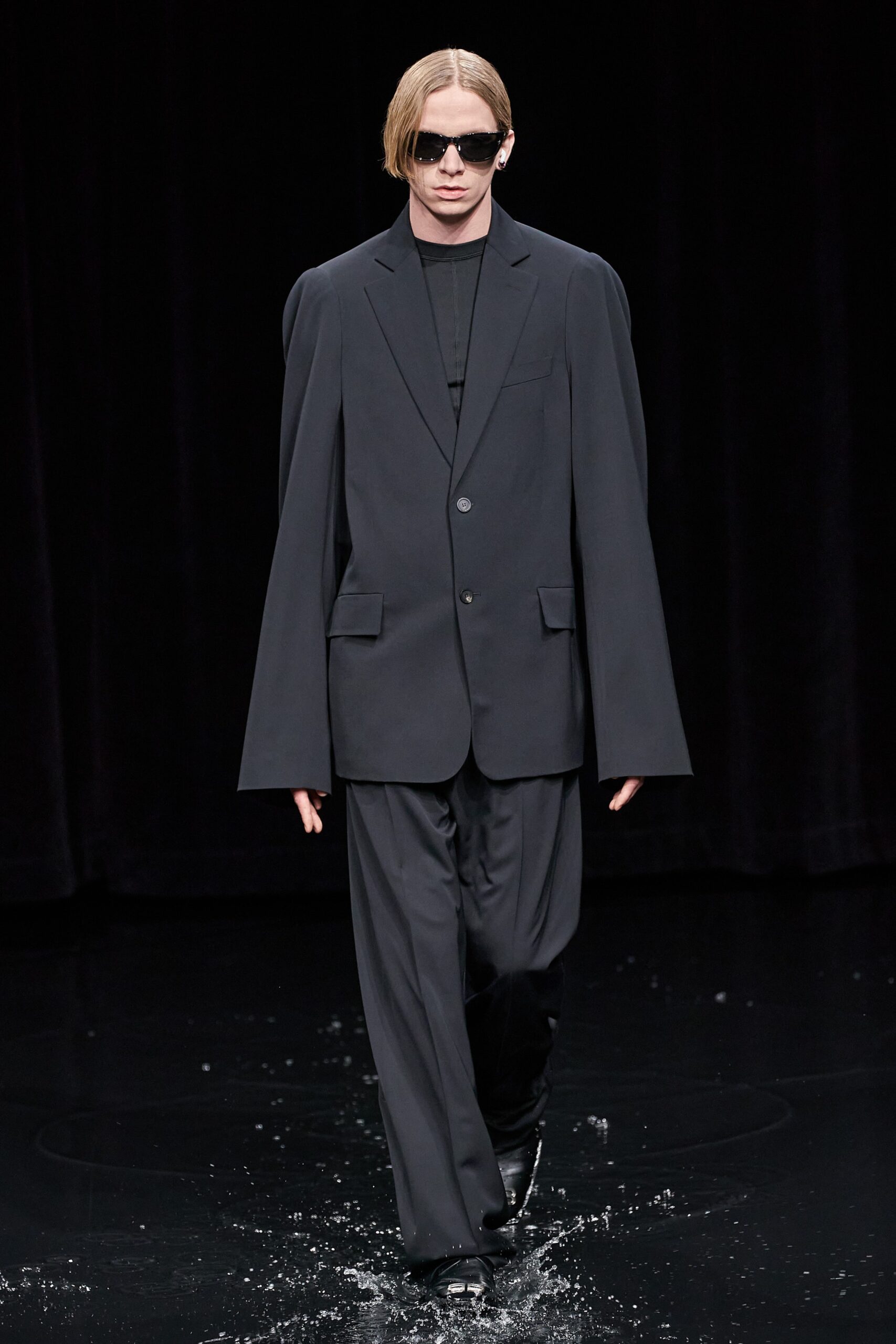 black tailored suit with shades