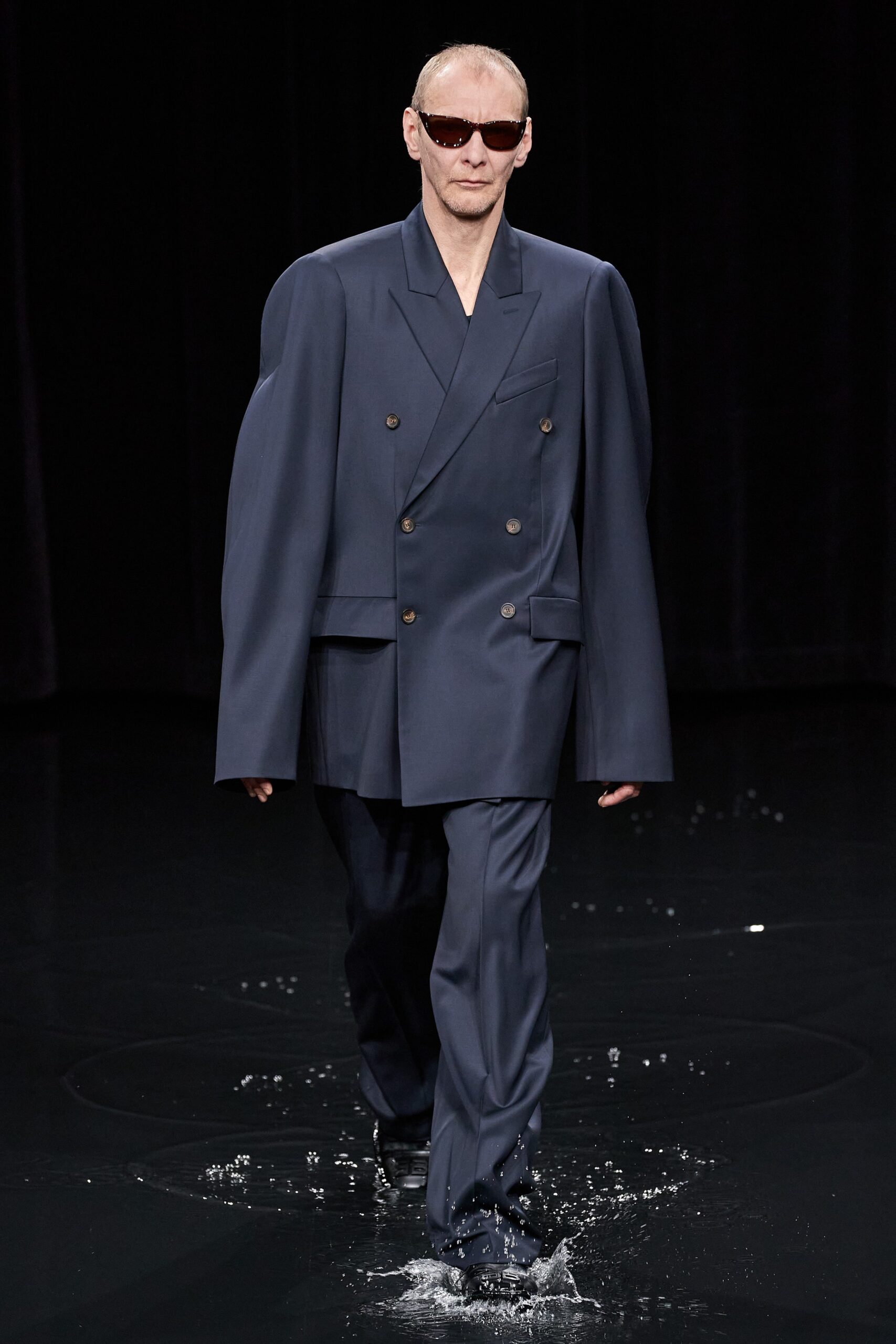blue oversized suit with sunglasses