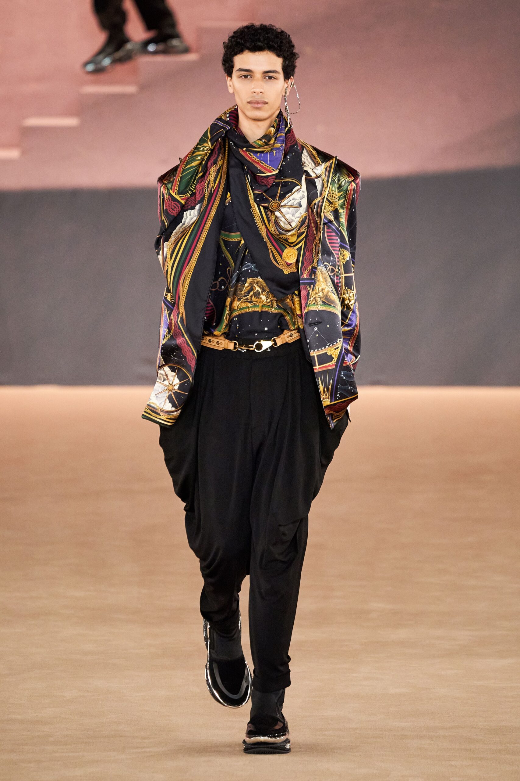 multi-colored relaxed top with black pants