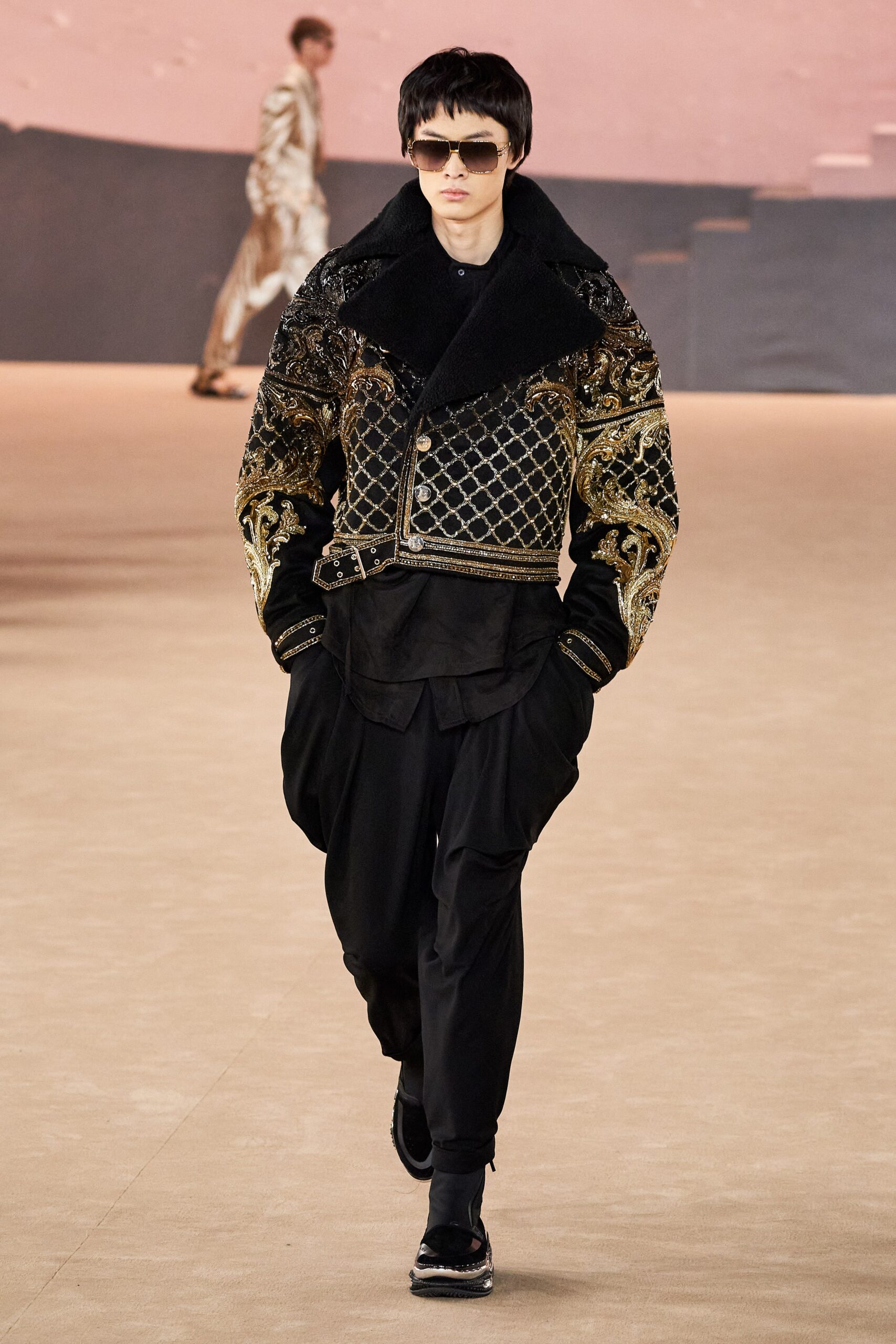 black embroidered jacket and relaxed pants