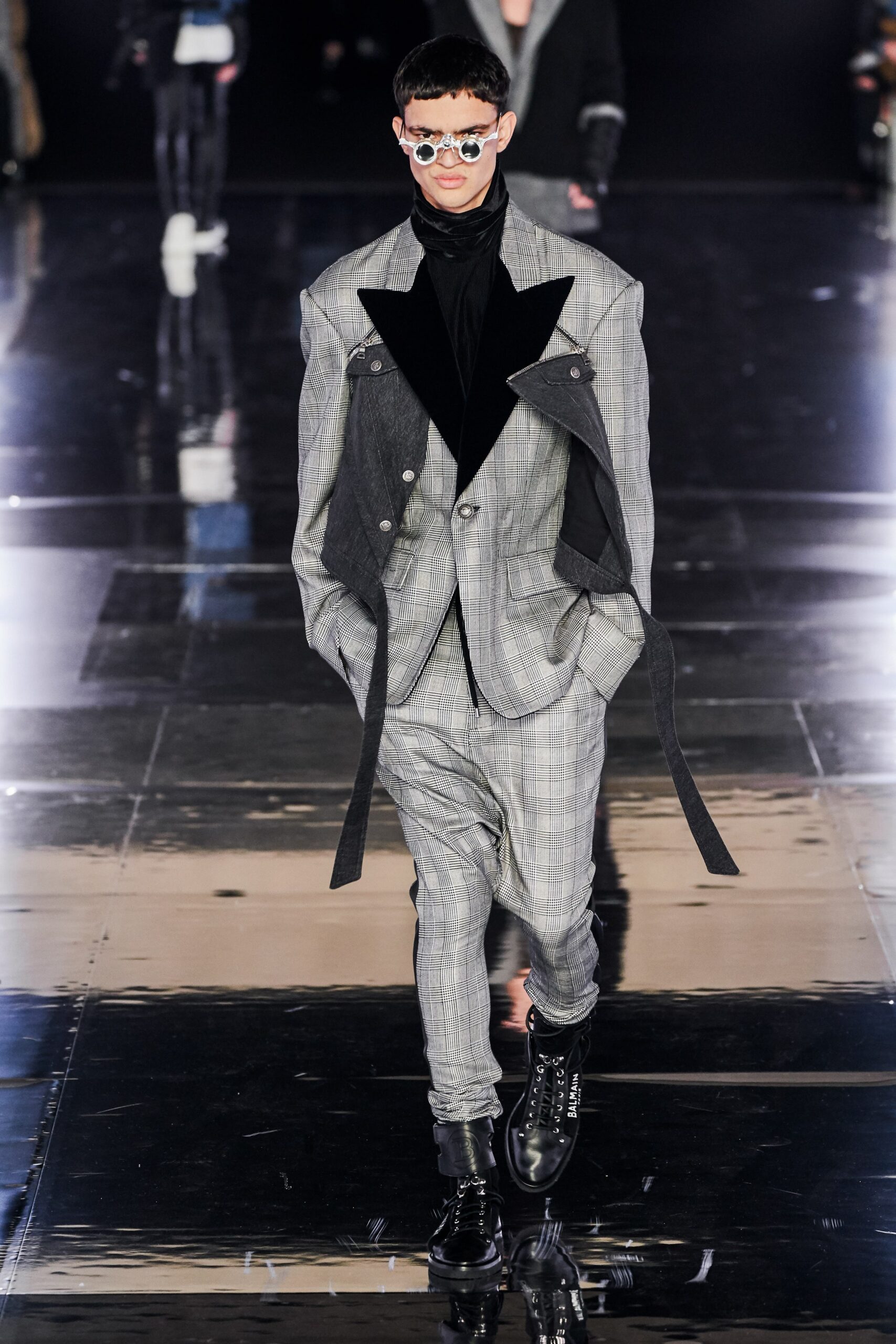 gray tailored suit with black turtleneck