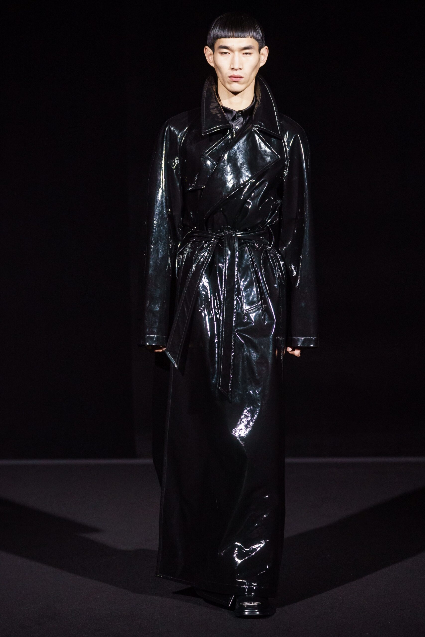 black vinyl belted trench coat