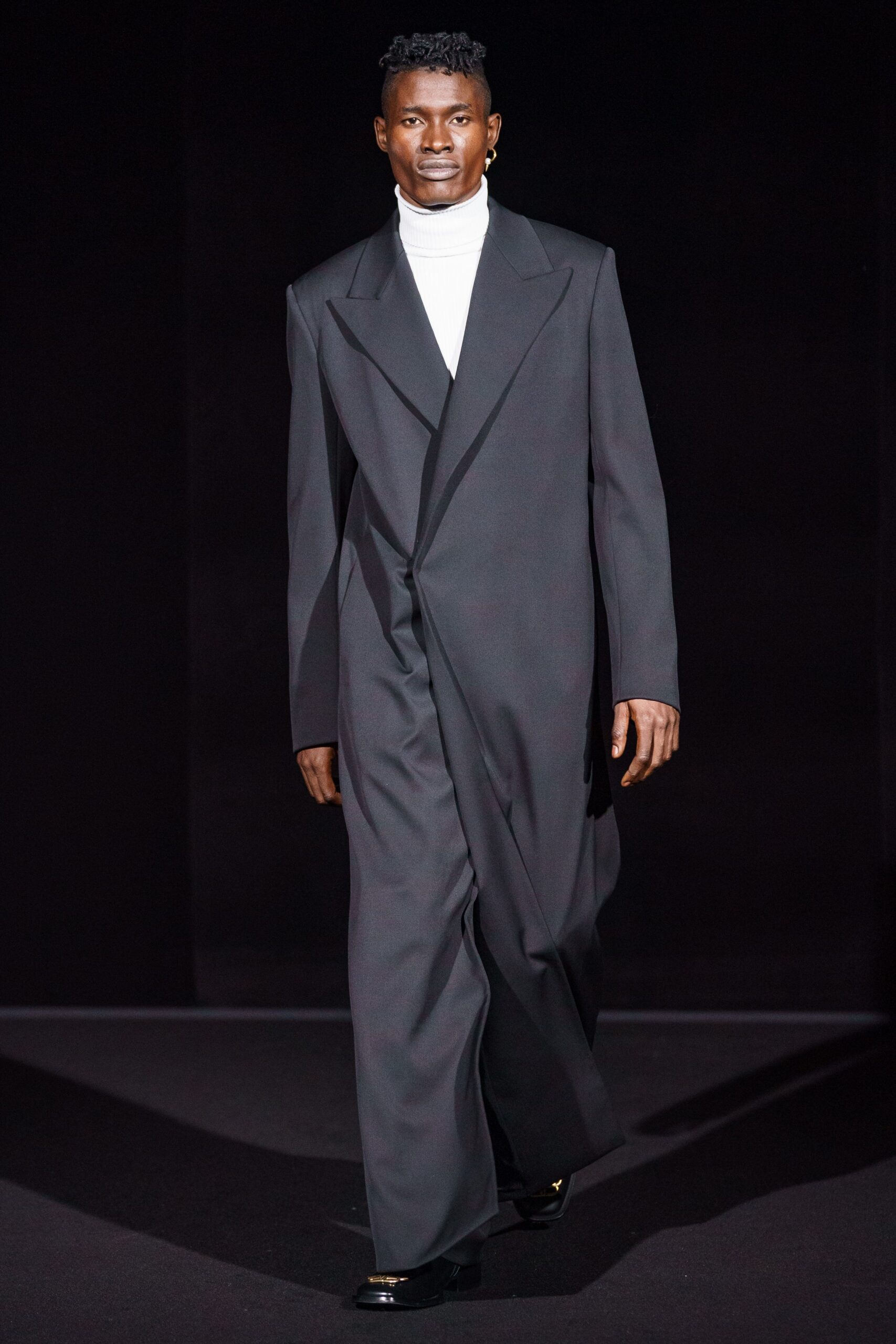 black wool coat with white top