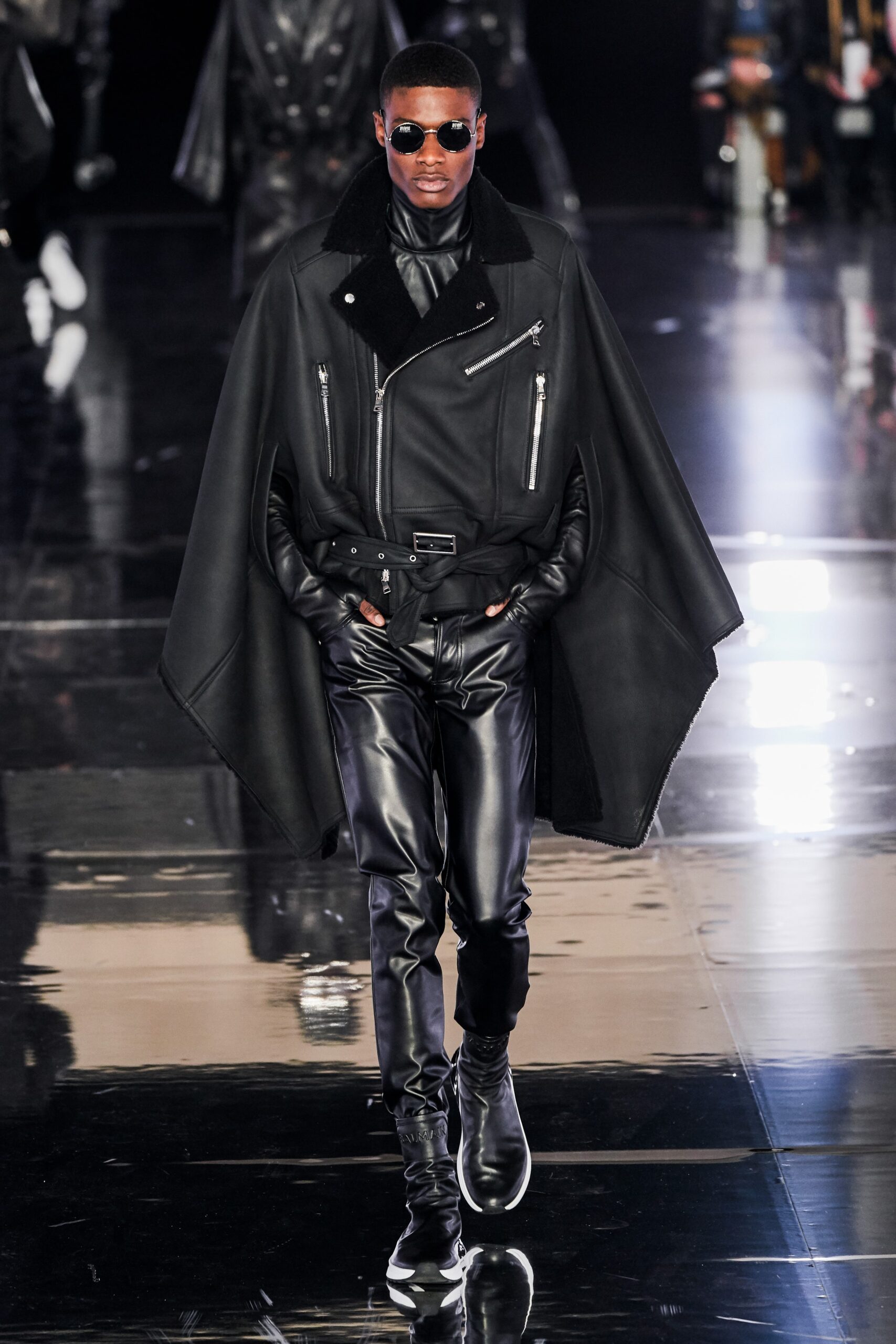 black leather long-sleeve structured zippered cape