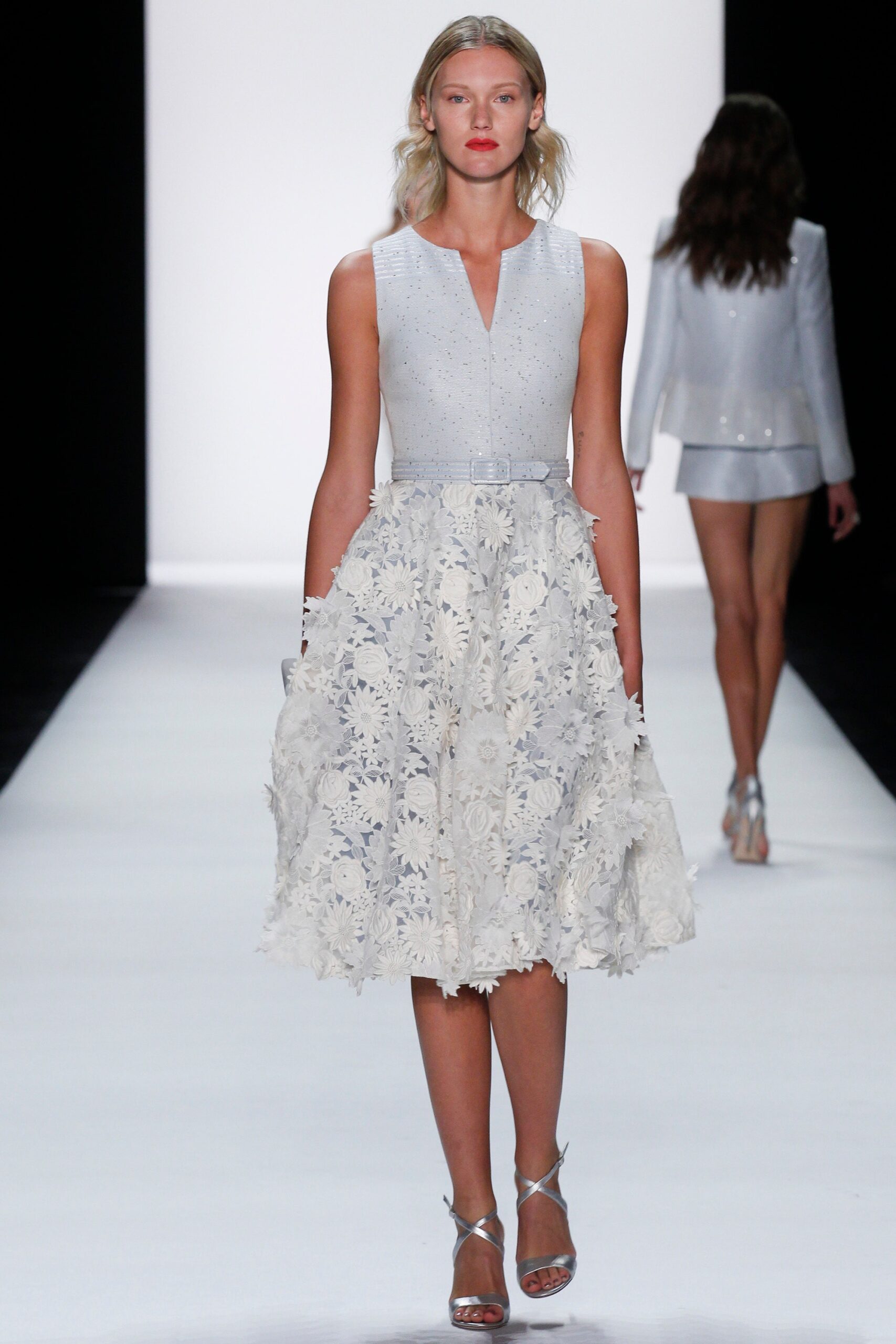 white embroidered sleeveless dress