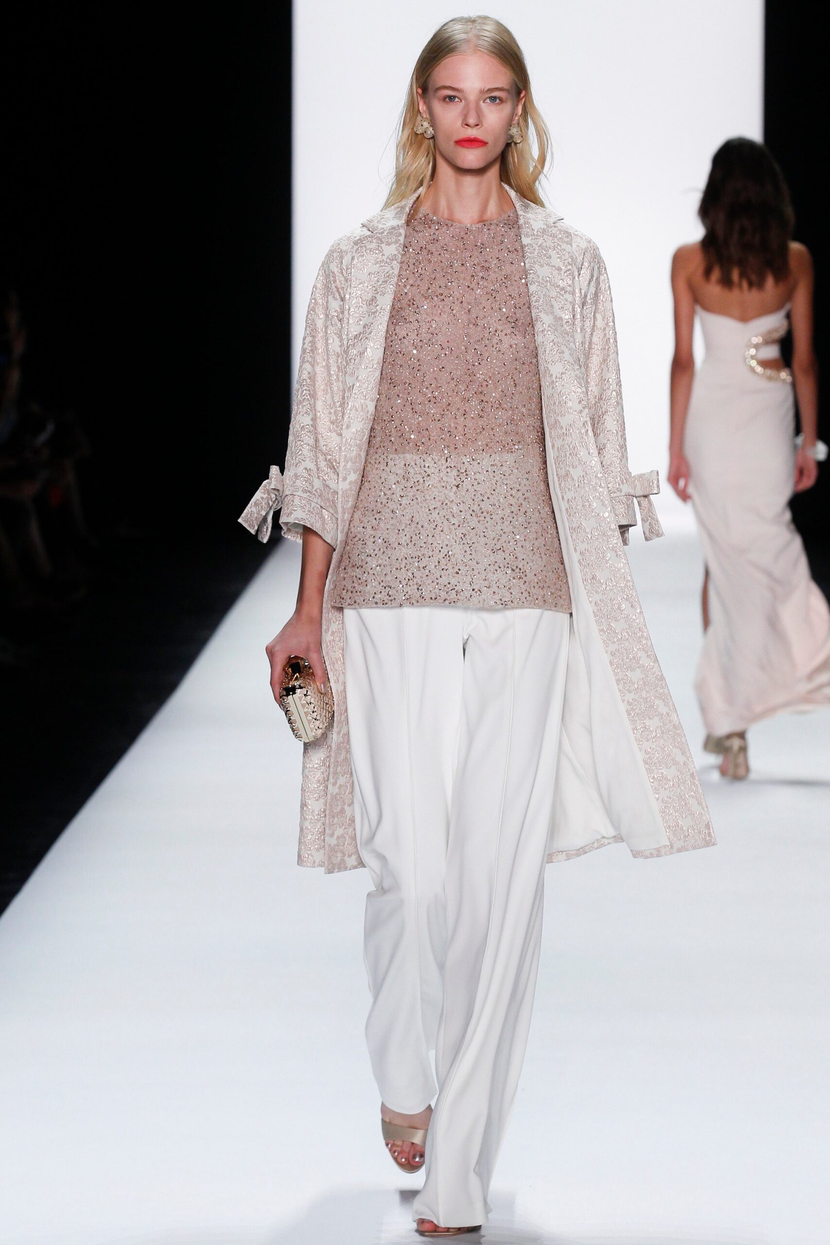 beige embroidered coat with pink top