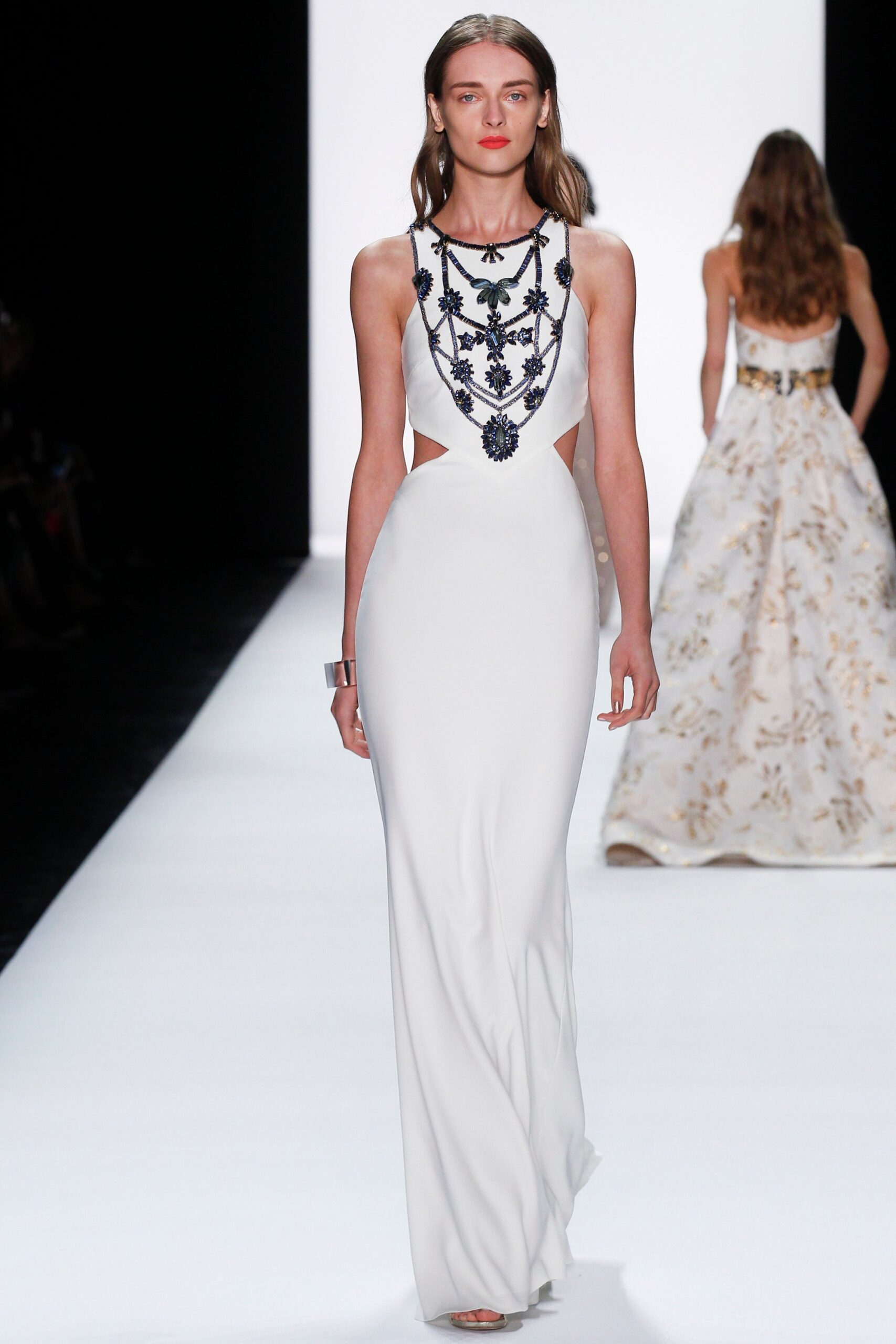 white silk embroidered gown
