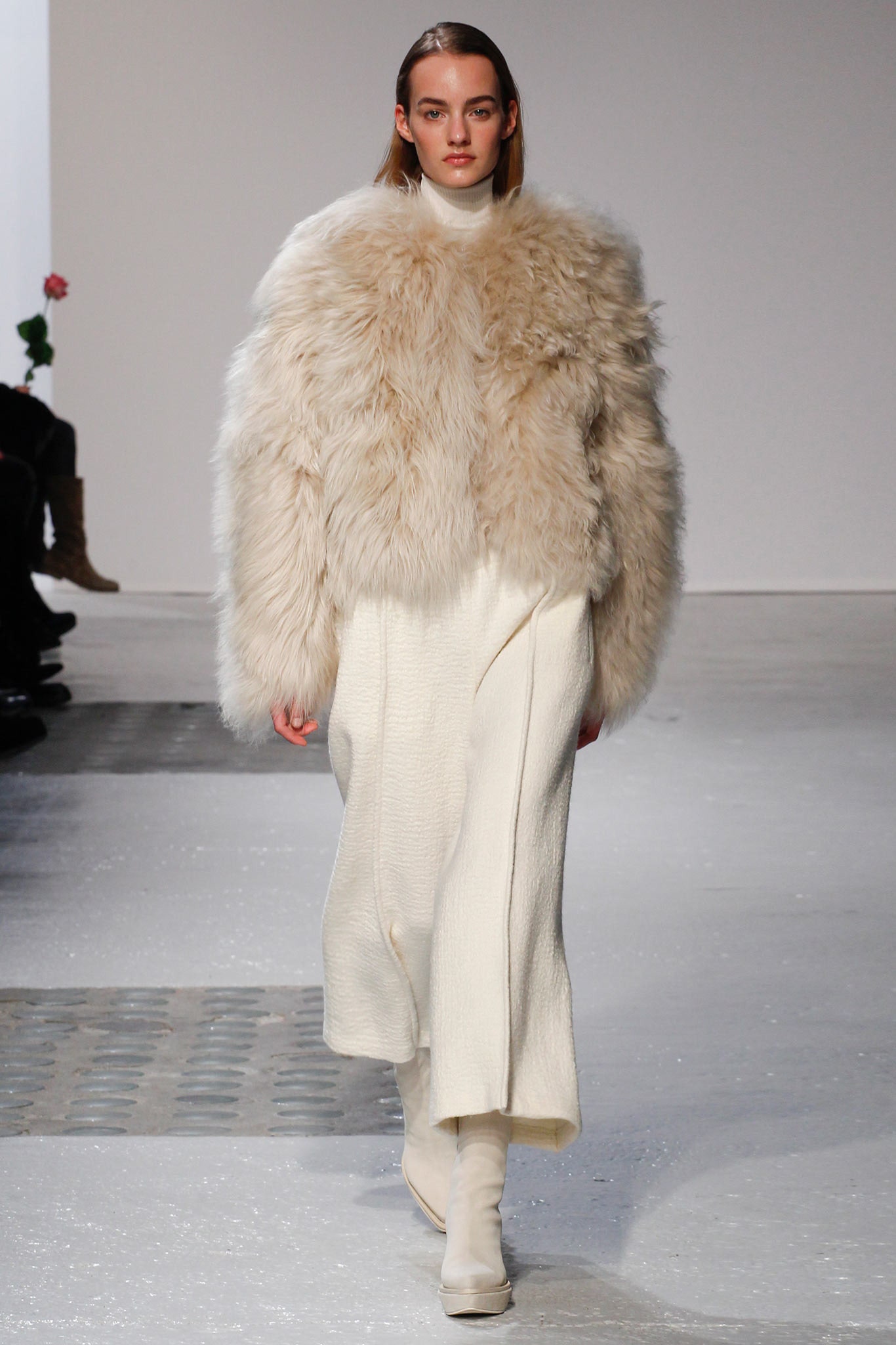 beige fur coat and white dress