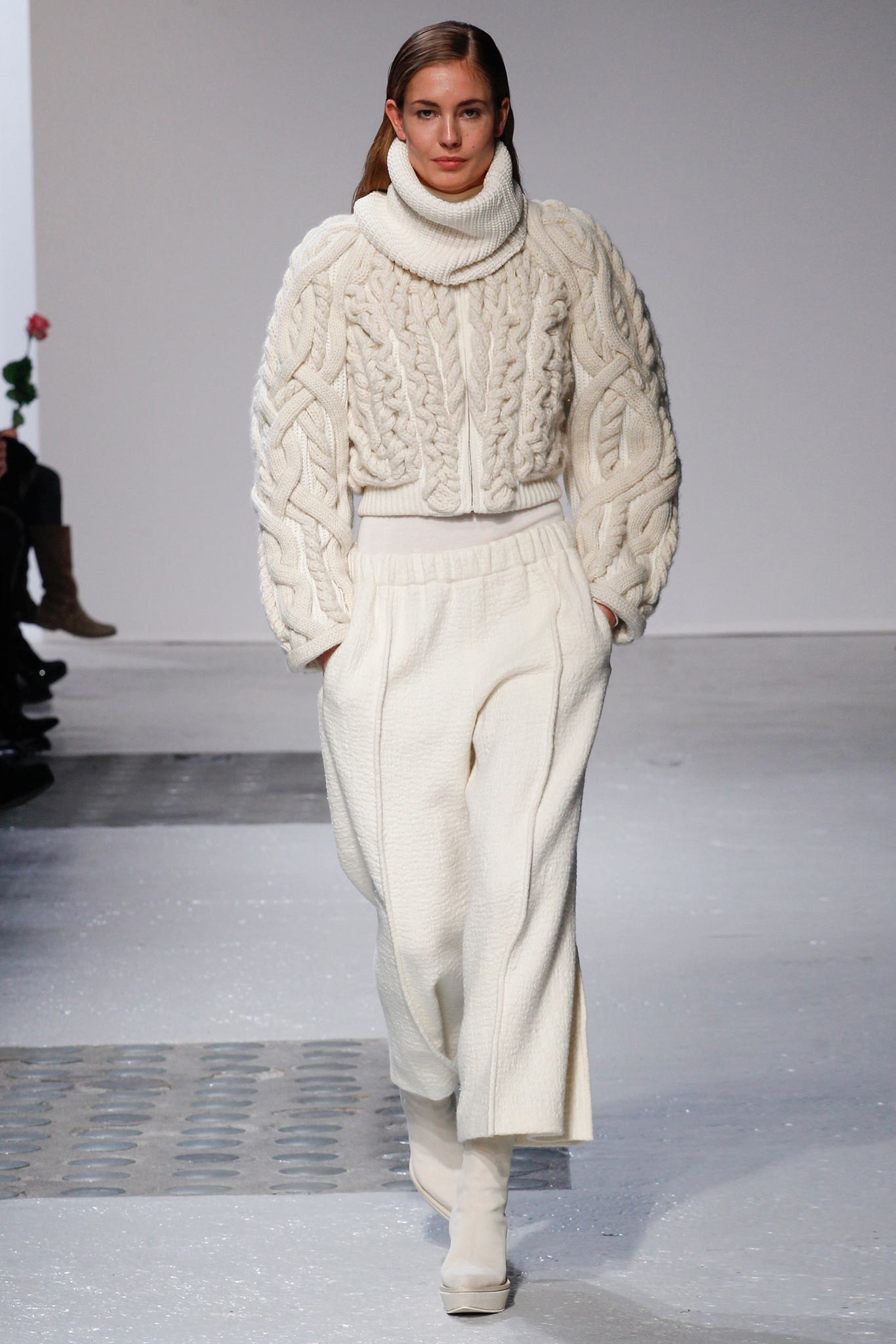 white cropped knitted sweater and relaxed pants