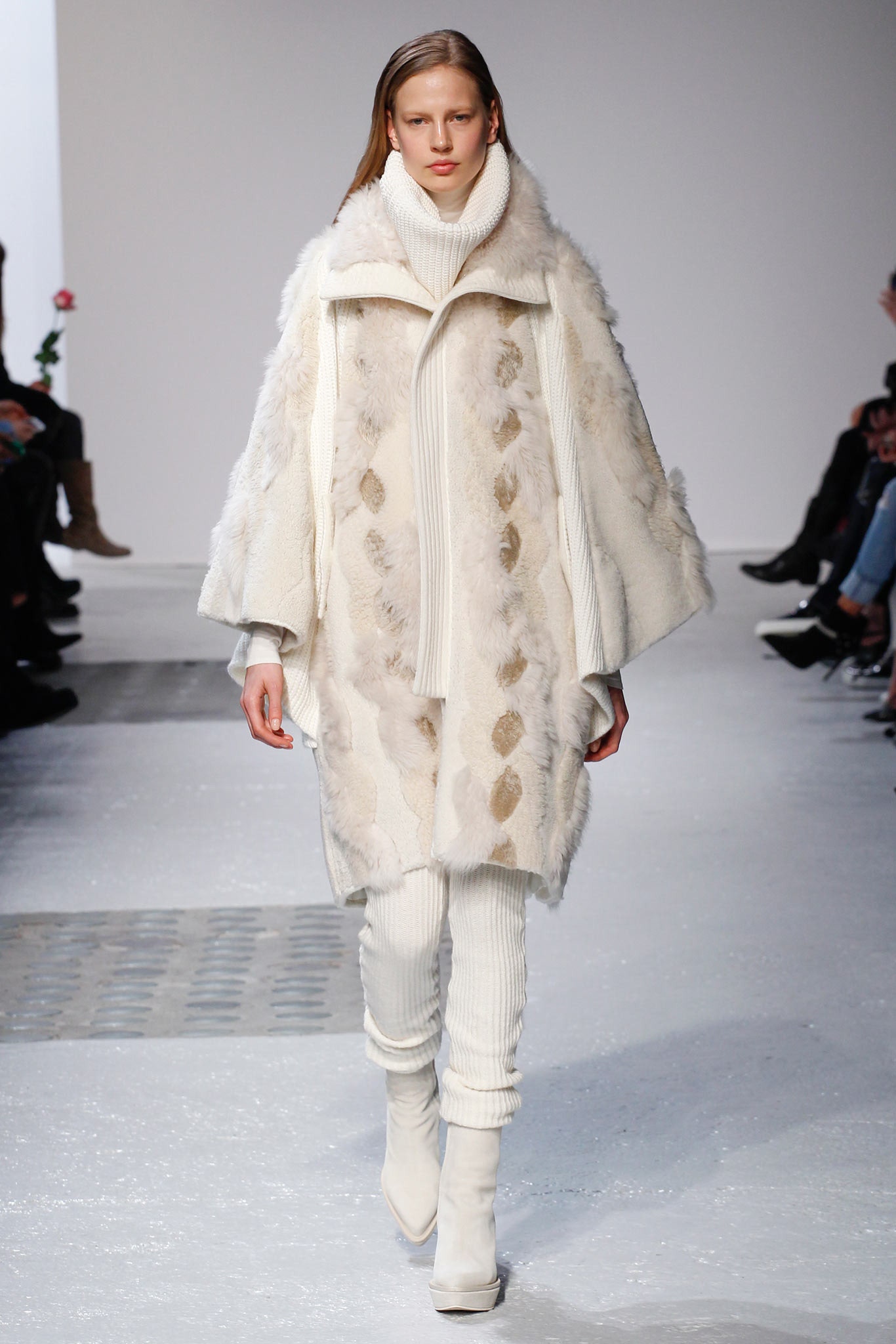 white fur cape with turtleneck sweater