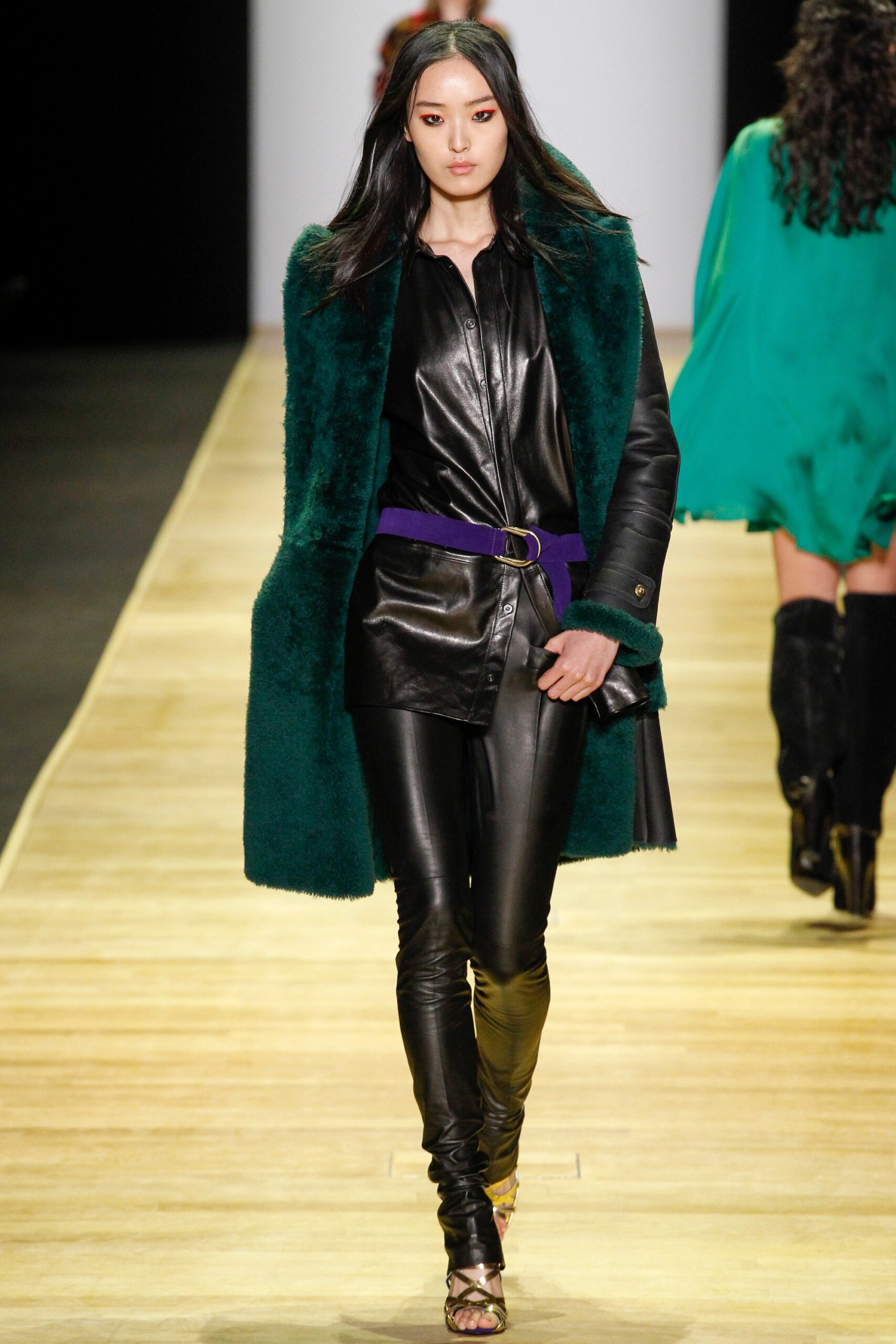 green fur coat with black leather outfit