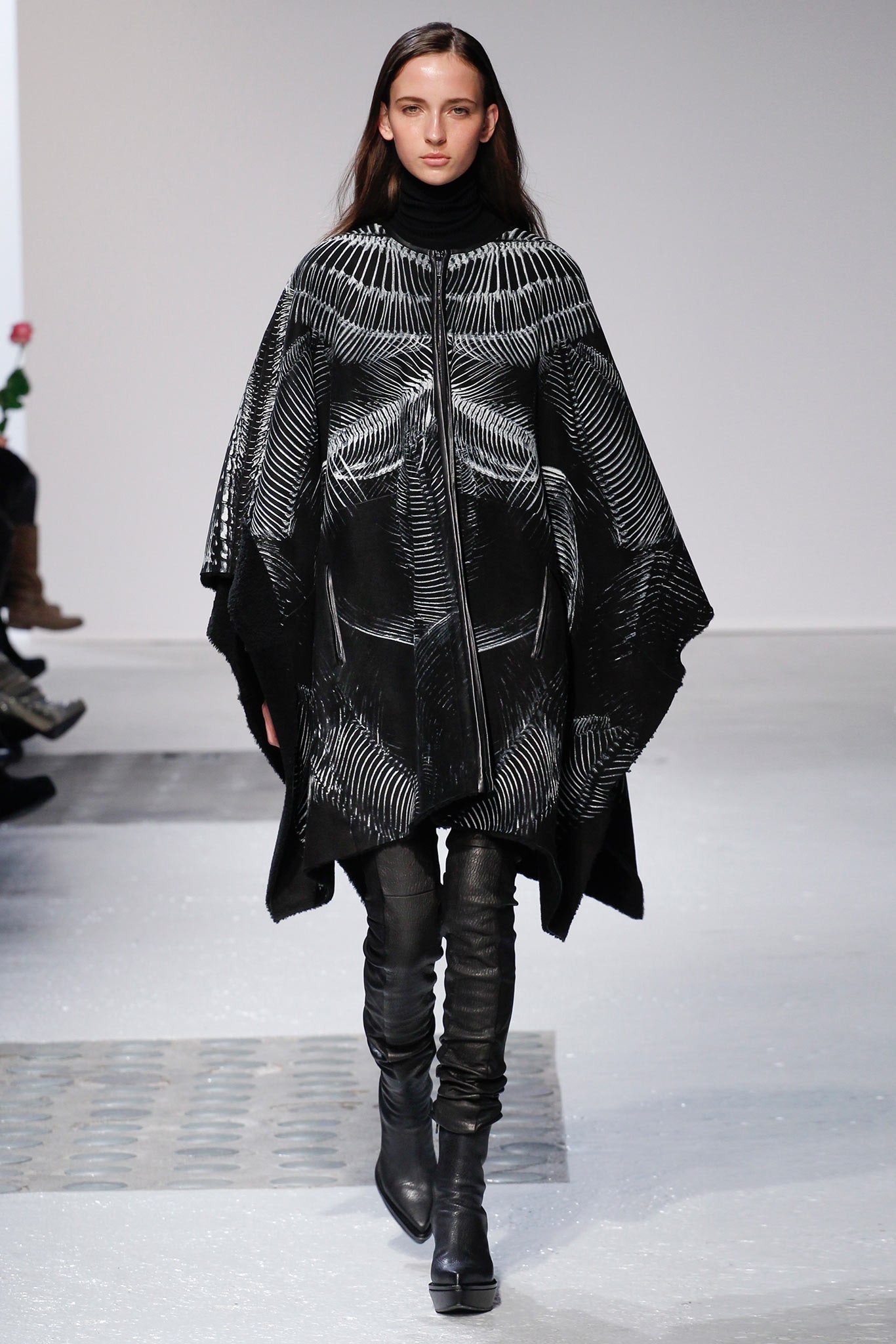 black wool sleeveless high-neck relaxed printed poncho