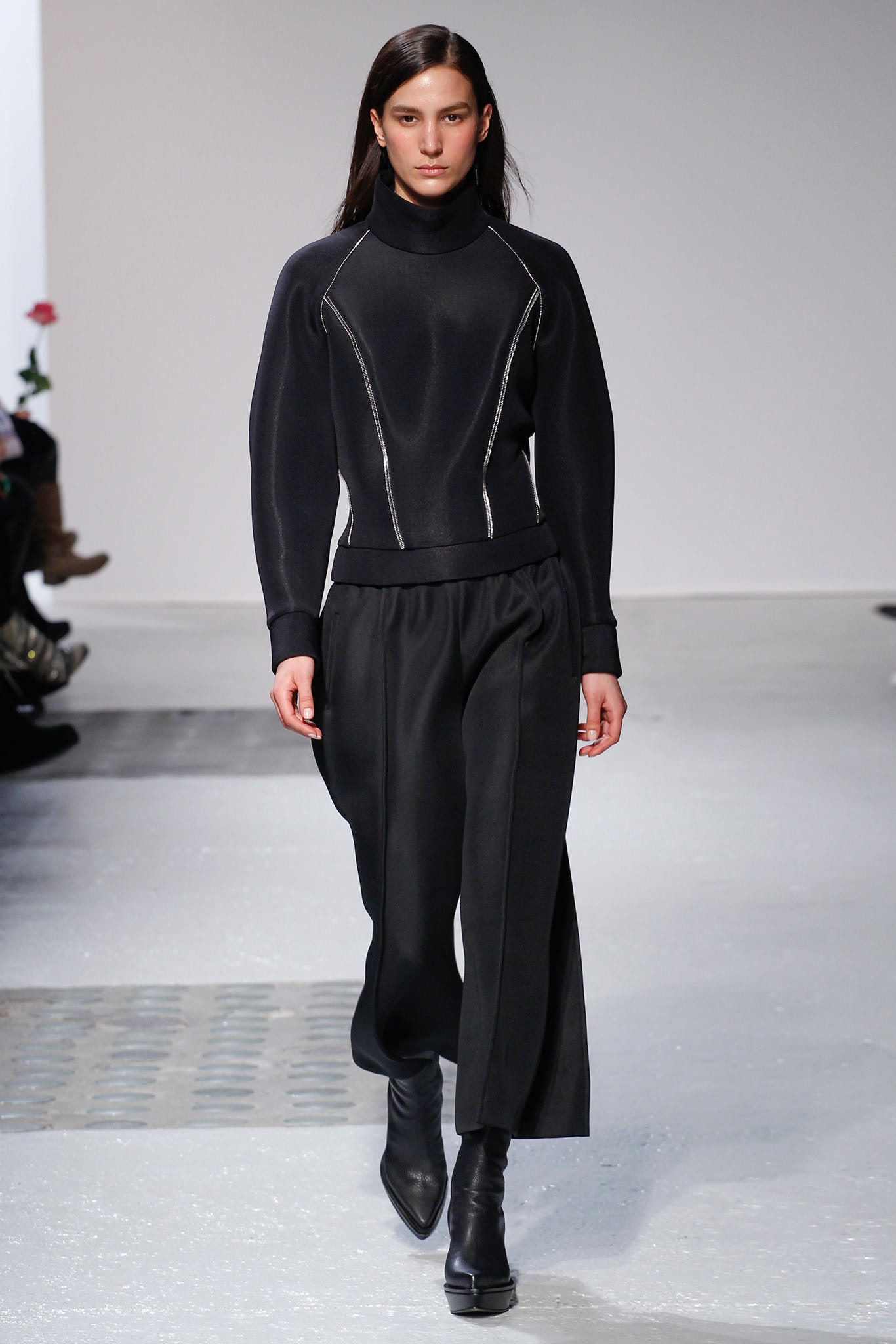 black fitted top and relaxed pants