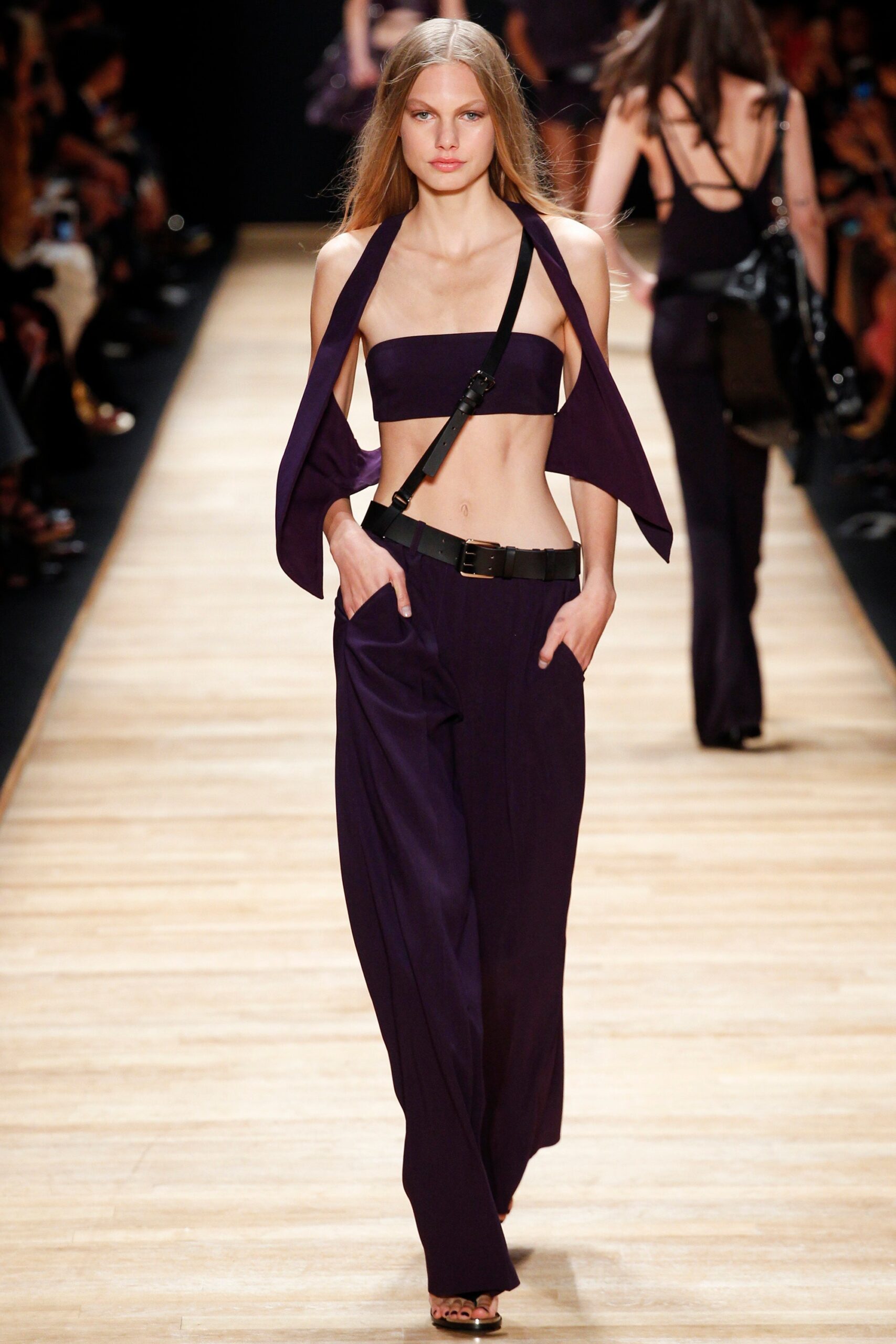 purple fitted crop top and relaxed pants