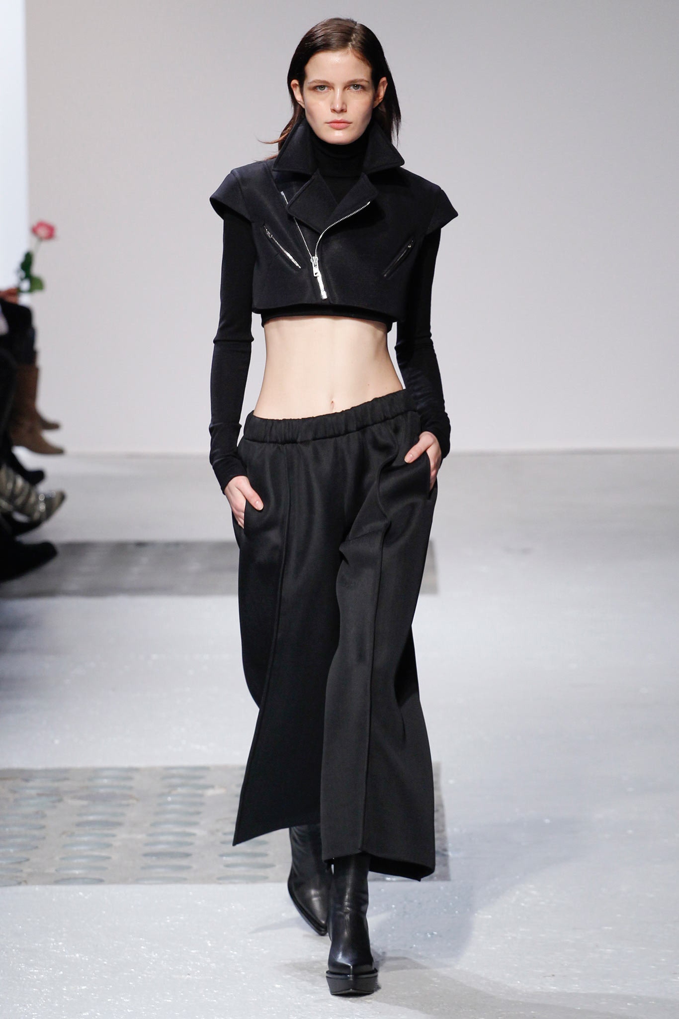 black fitted top and relaxed pants