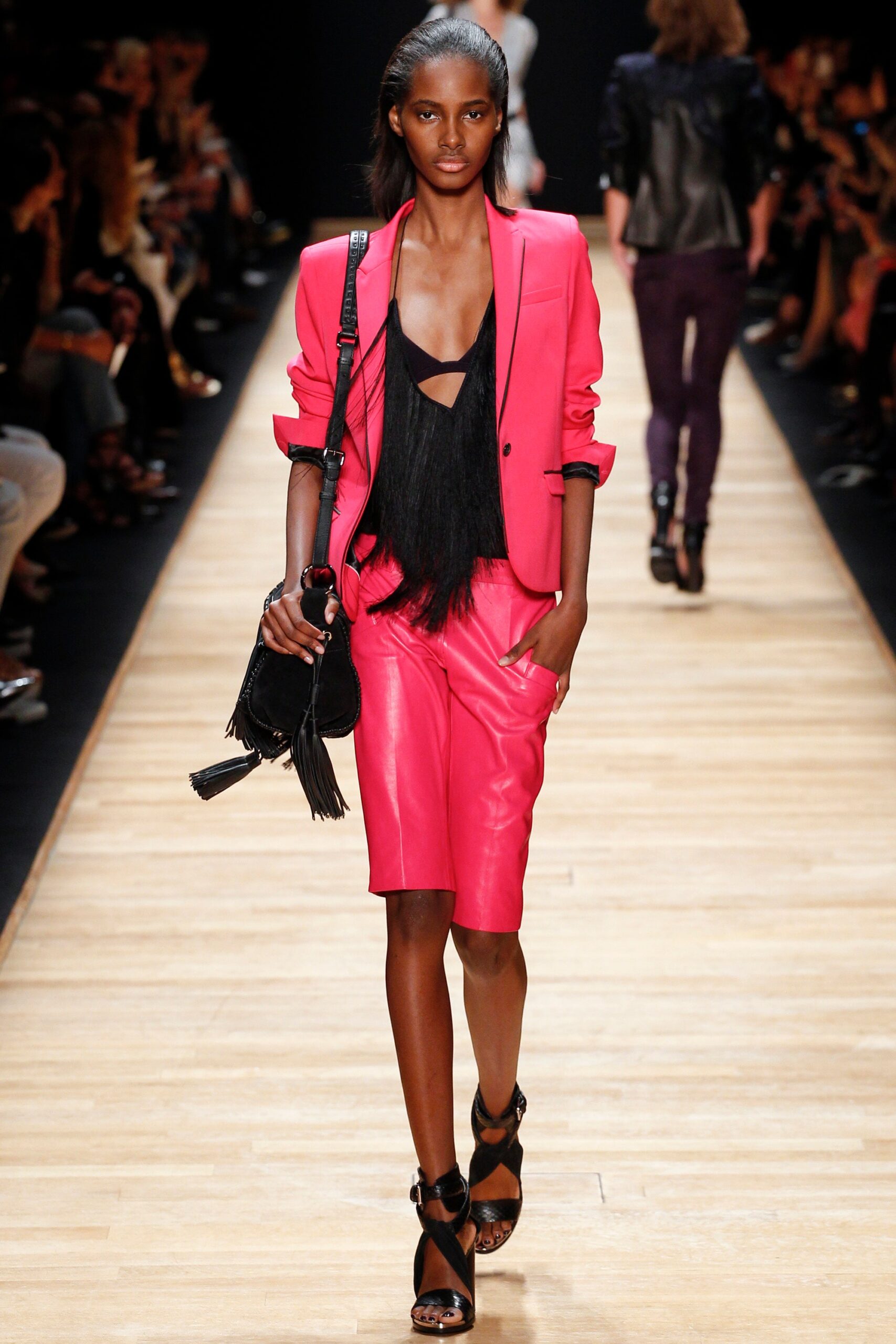 pink leather suit with fringed top