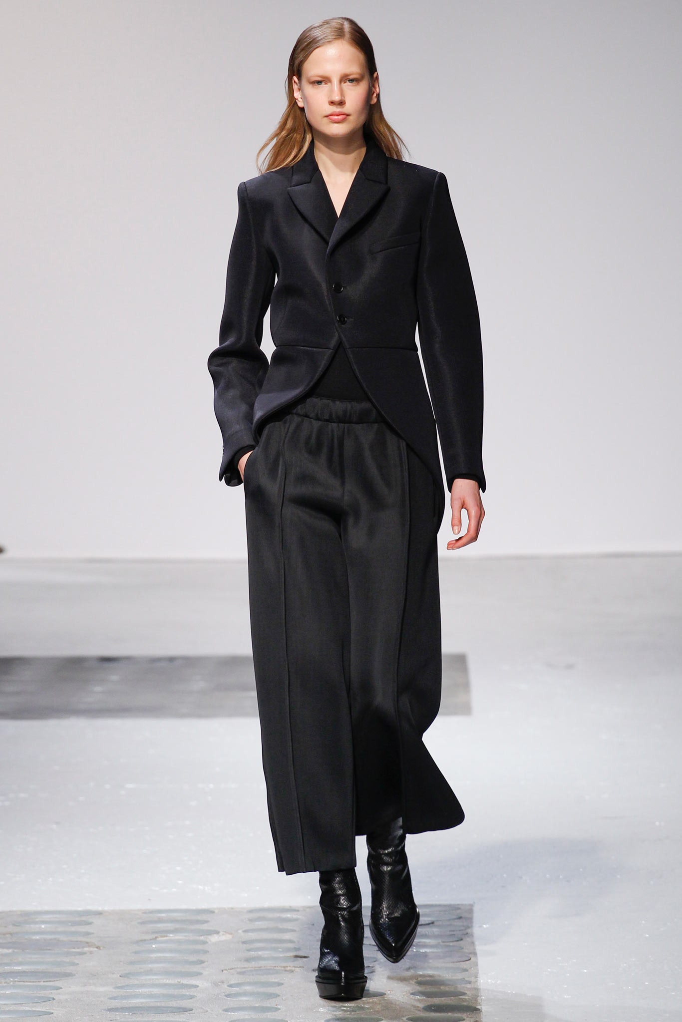 black tailored blazer and relaxed pants