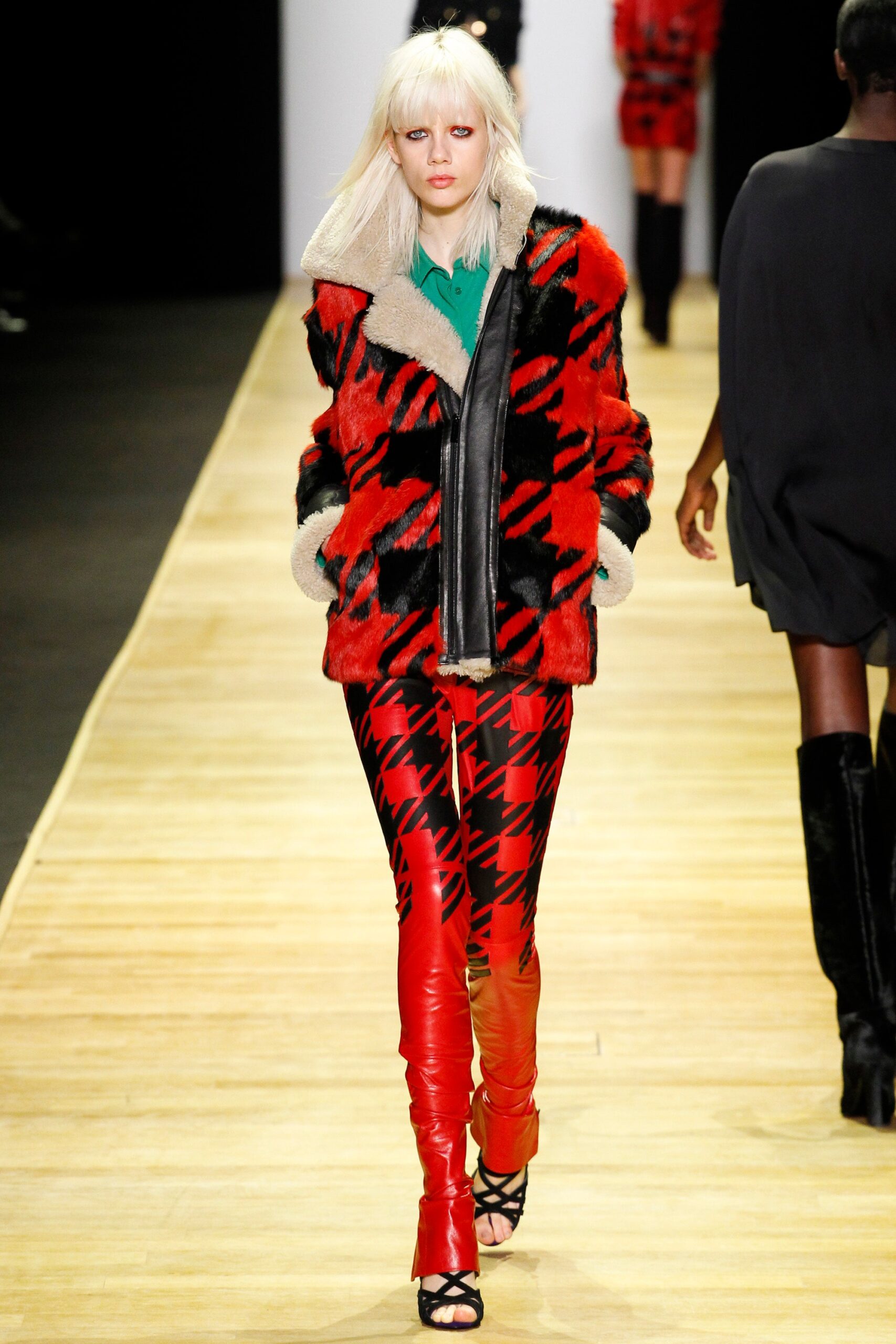 red and black faux-fur jacket with vinyl pants