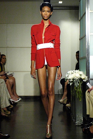 red fitted jacket with white shorts