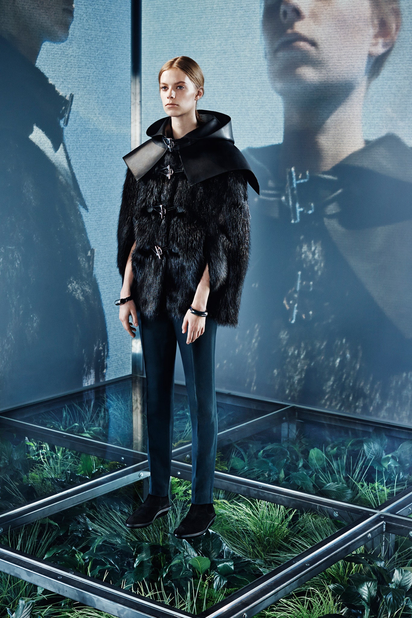 black fur coat and slim pants