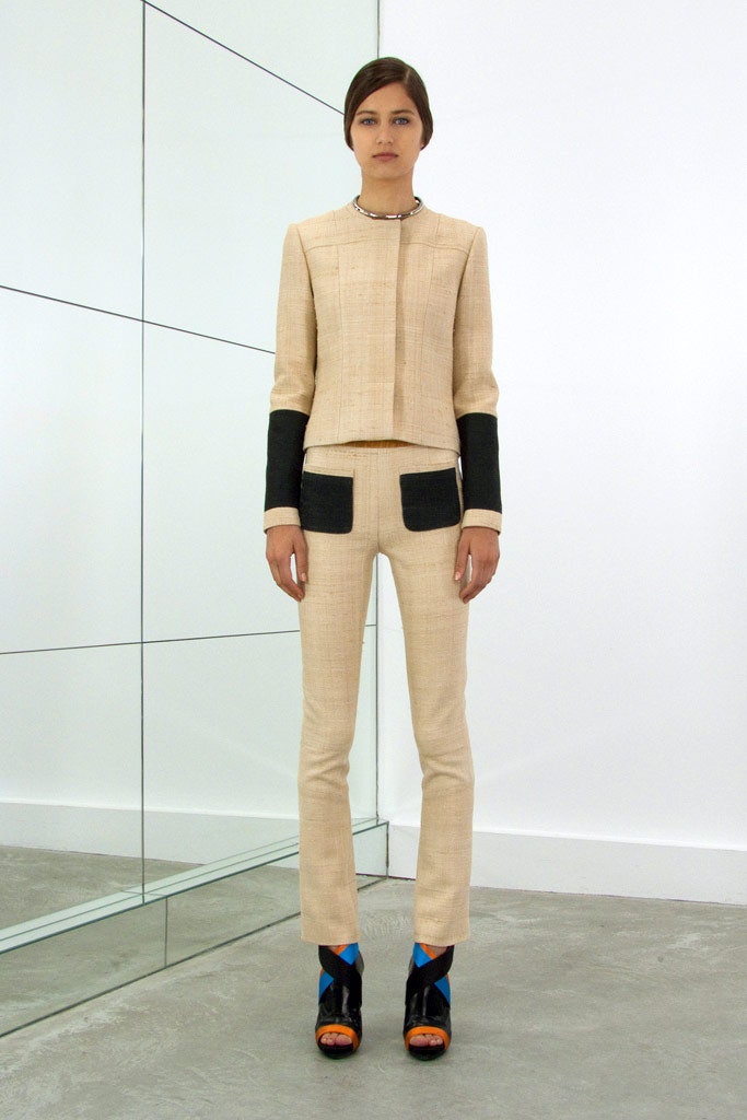 beige tailored suit with black shoes