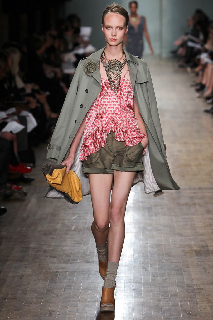 gray coat with ruffled red top