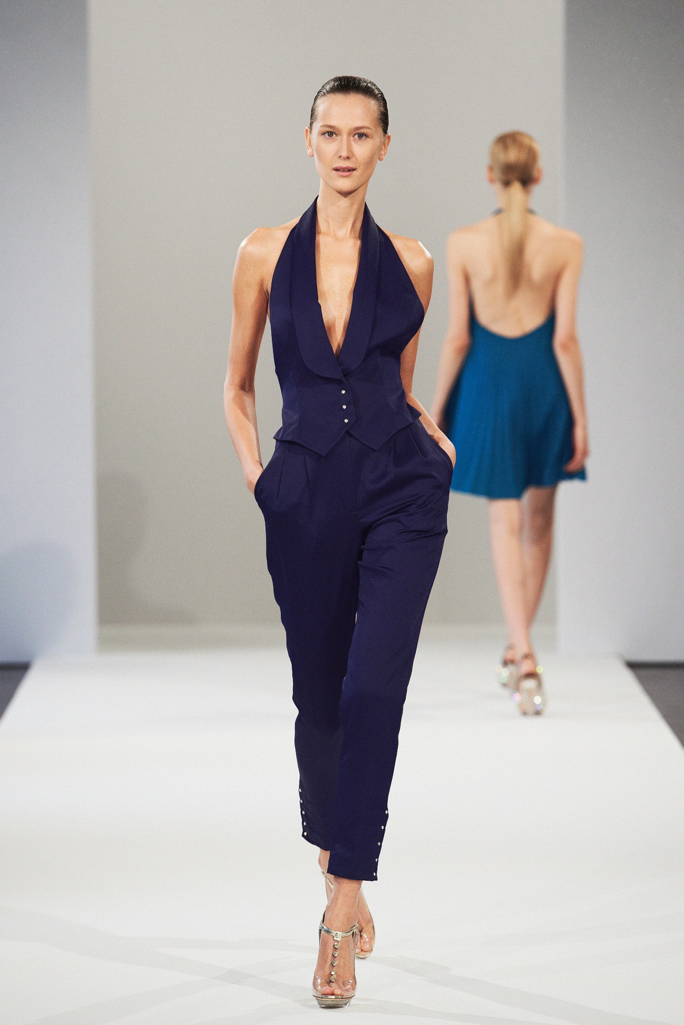 navy jumpsuit and blue dress