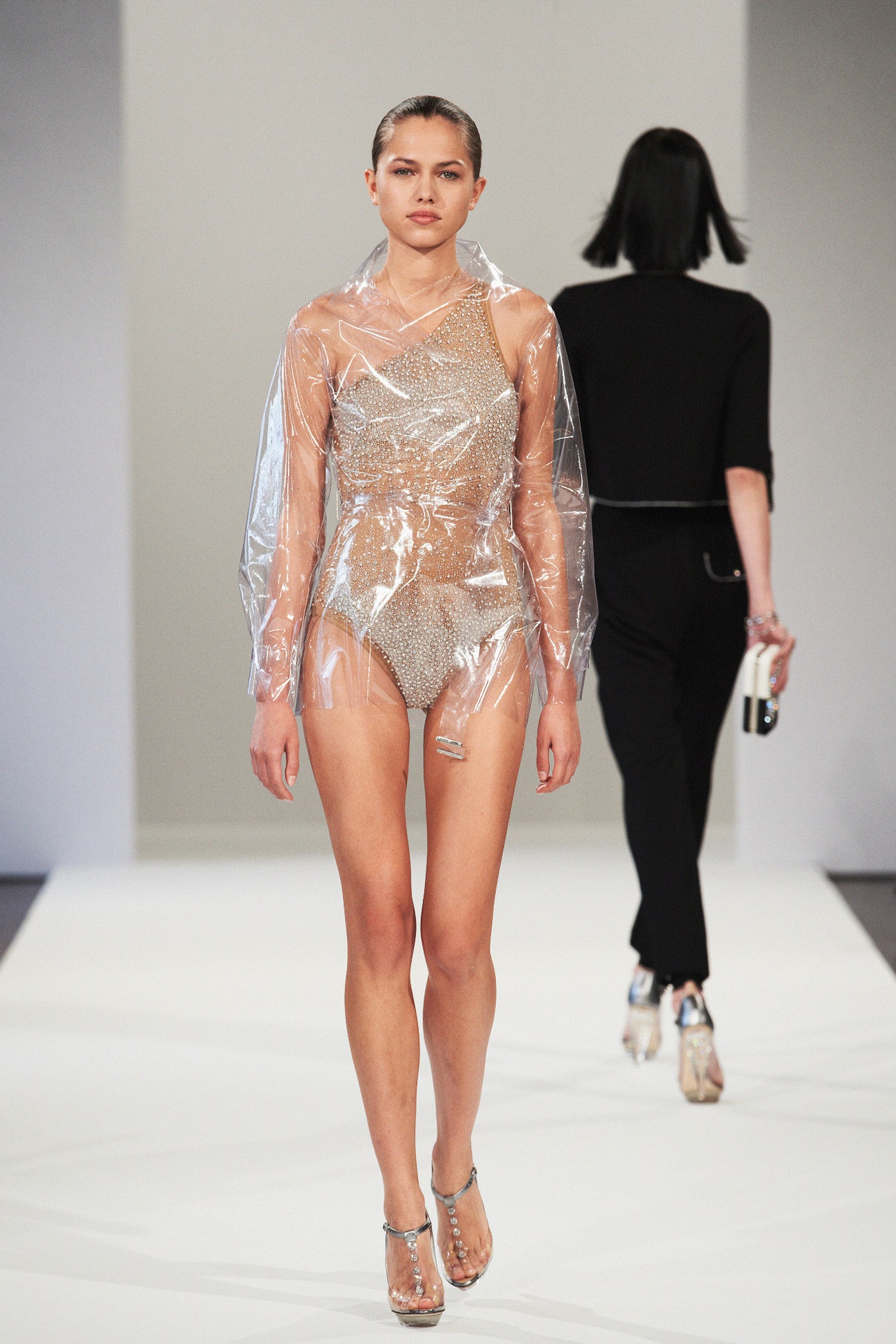 clear vinyl jacket and silver swimsuit