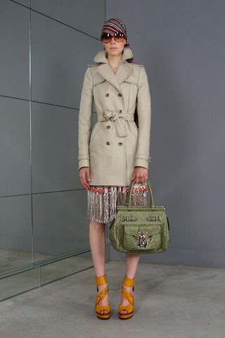 beige trench coat with pleated skirt