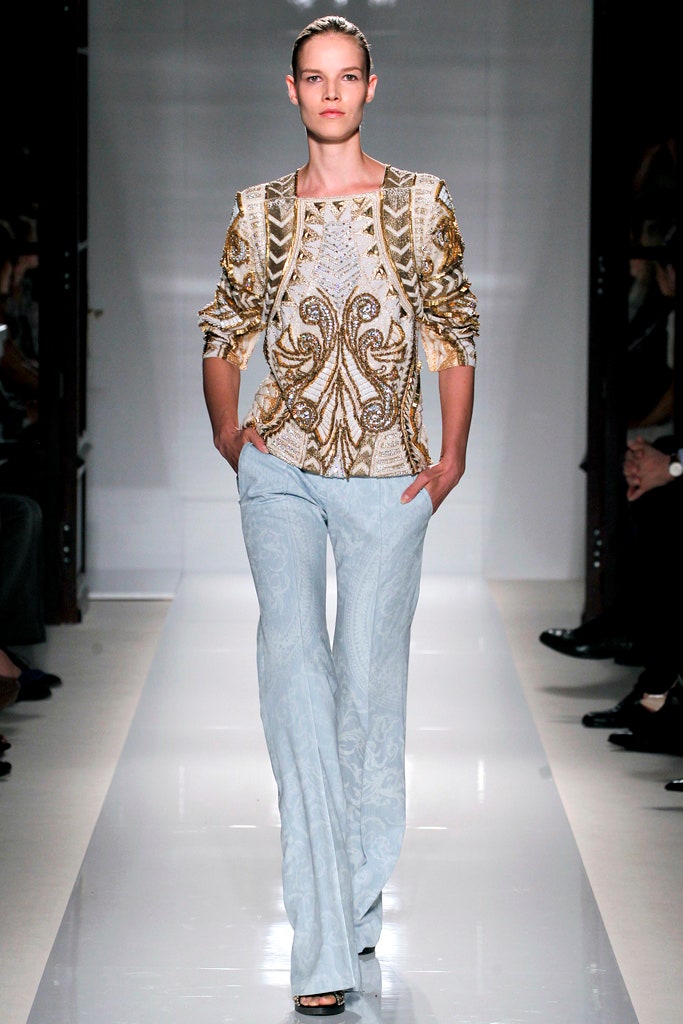 gold embroidered top with light blue pants