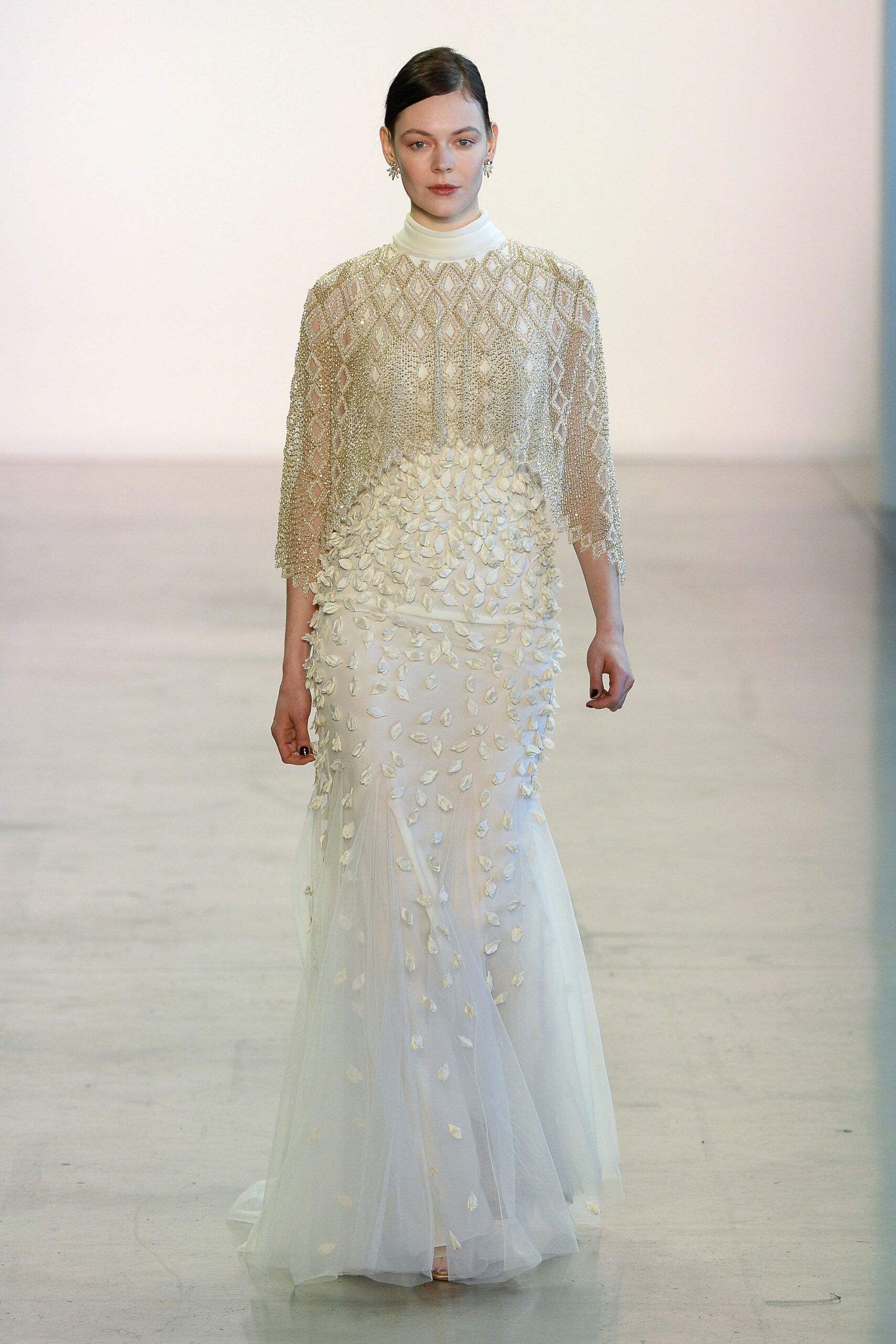 white embroidered long-sleeve gown