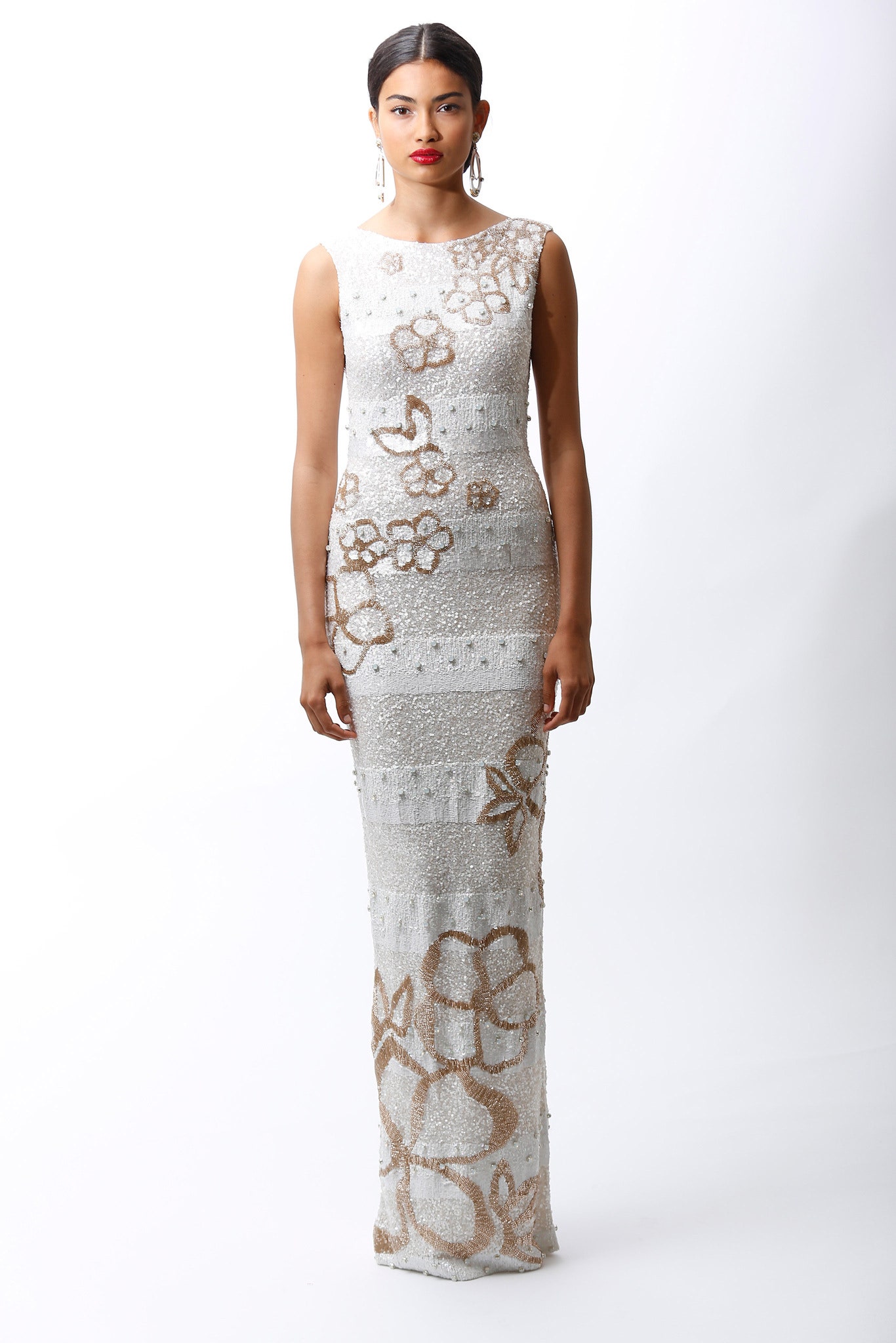 white and gold embroidered gown