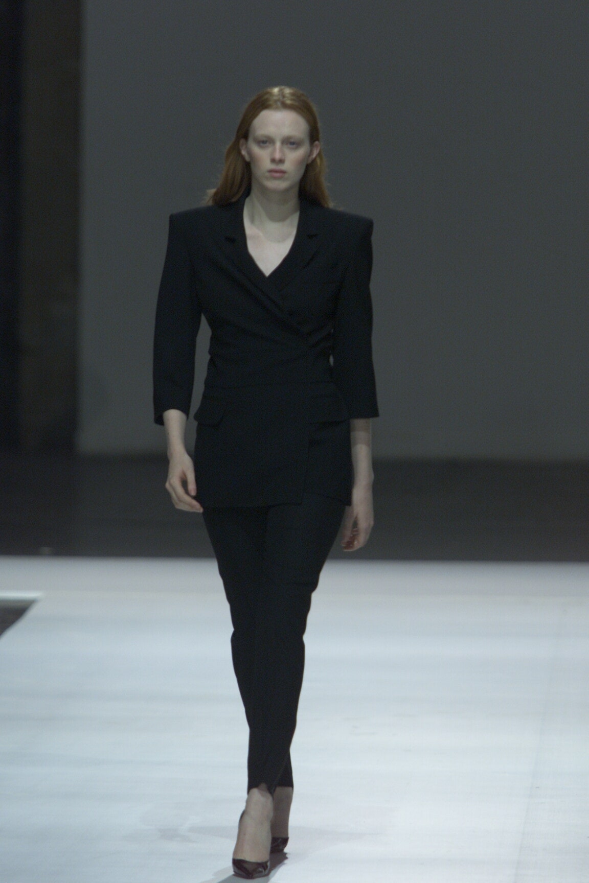 black tailored blazer and slim pants