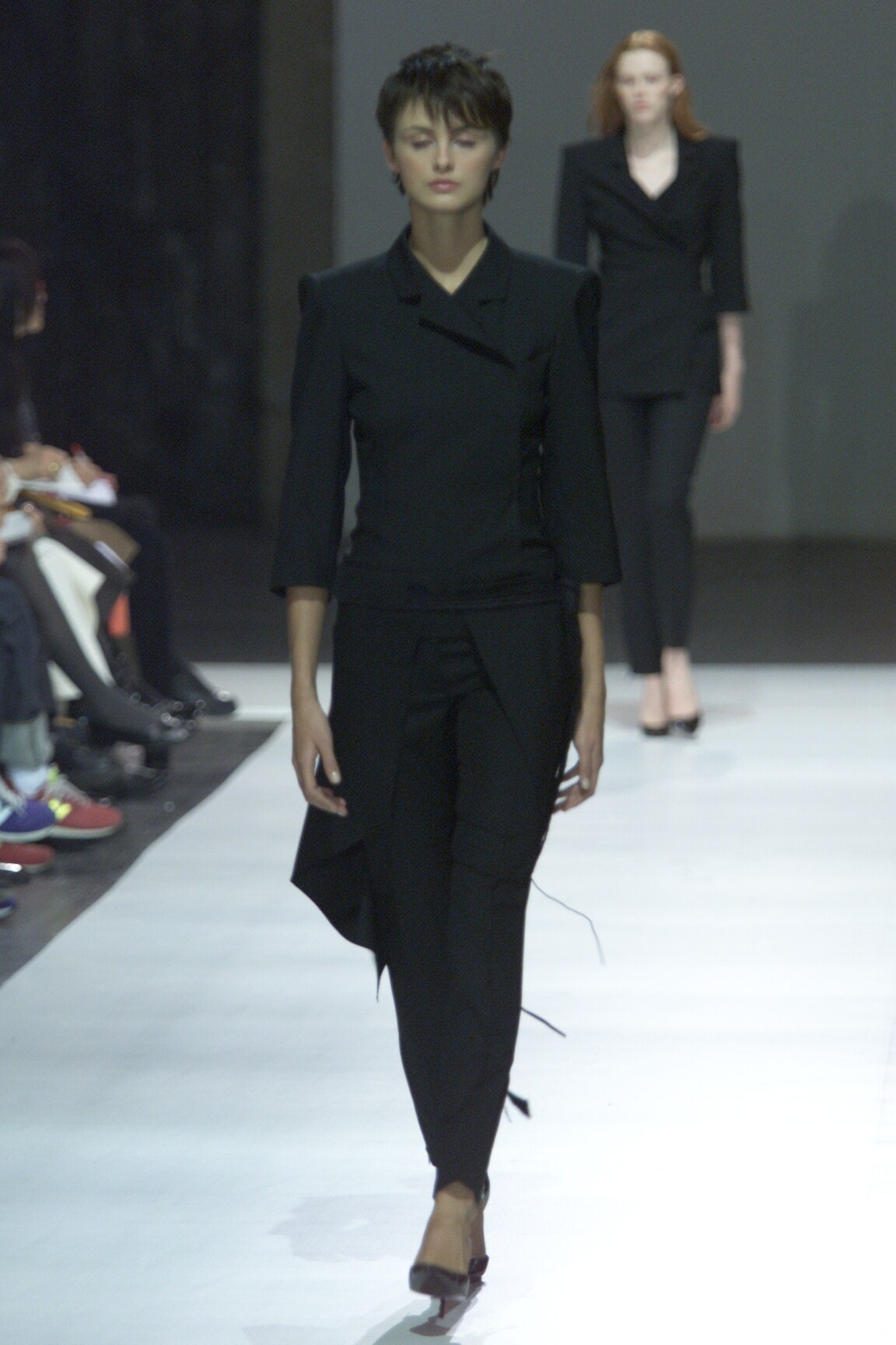 black tailored blazer and slim pants